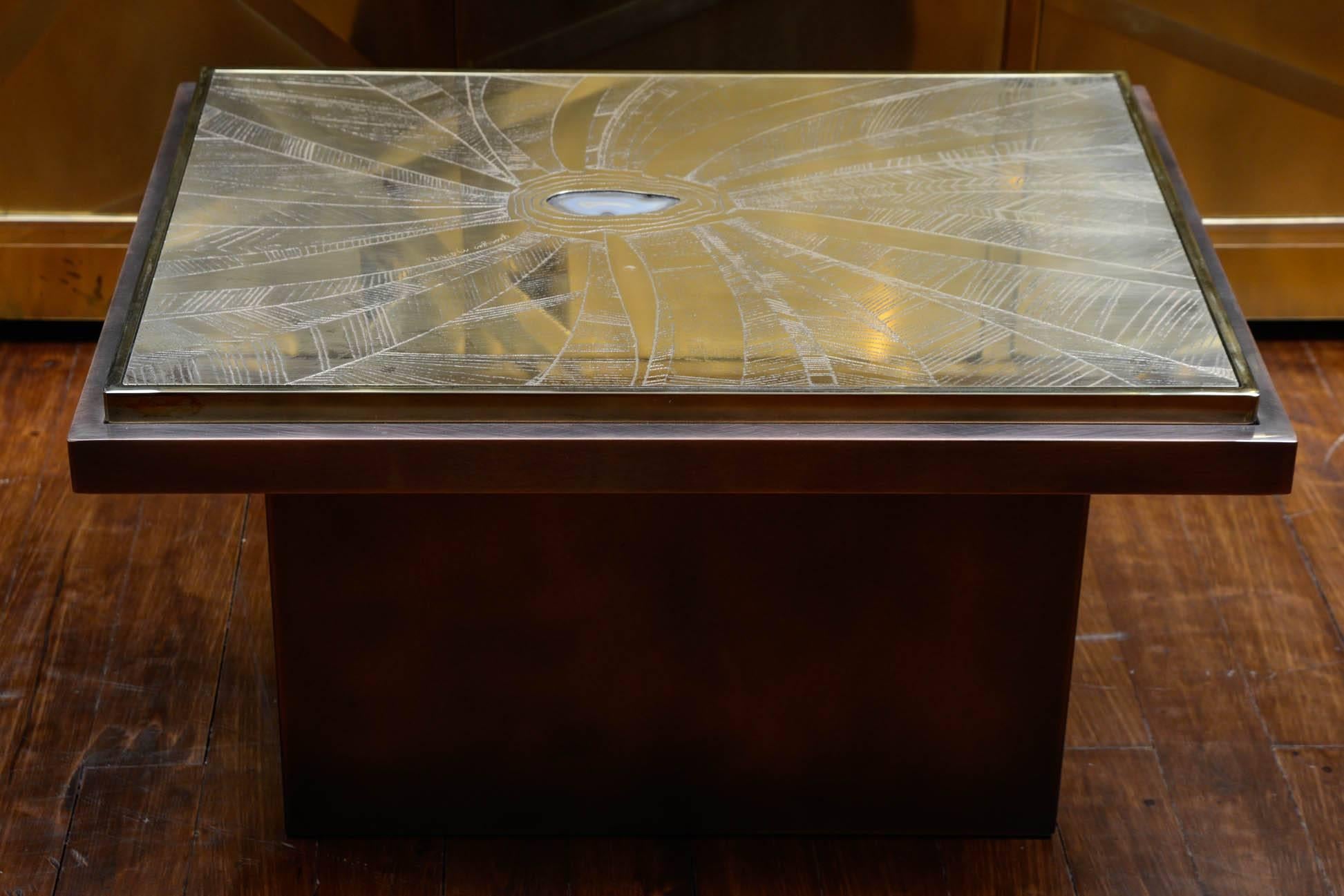 Pair of patinated brass low tables by Georges Matthias, engraved top with agate inlaid.