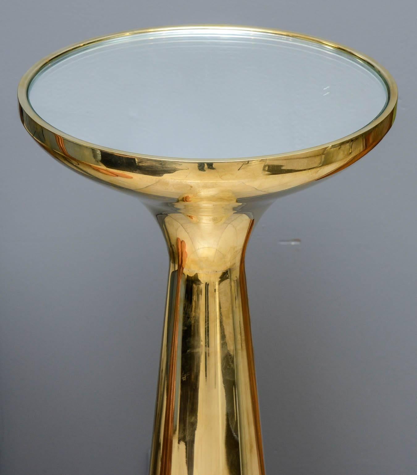 Set of four pedestal in brass with top mirror, sold by pair
Style: Fontana Arte.