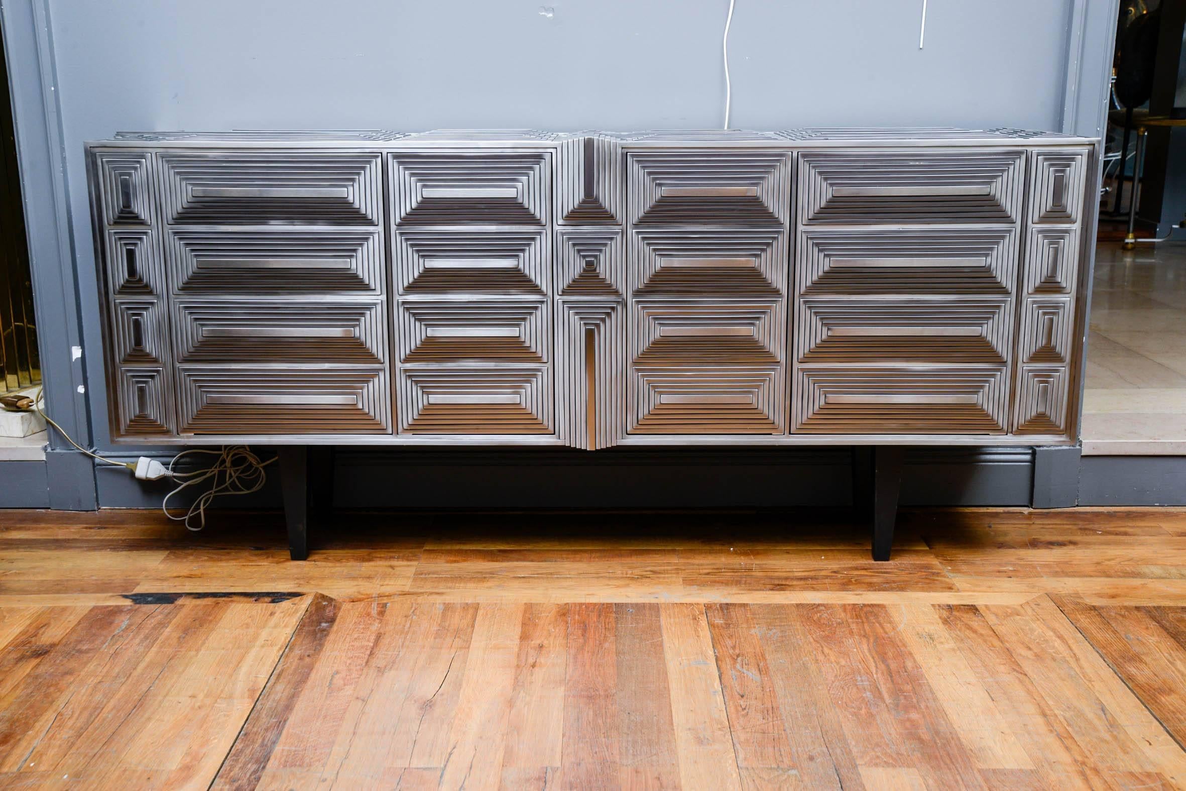 Sideboard by Erwan Boulloud in stainless steel, pyramid-shaped sculpture, four doors, shelves inside.