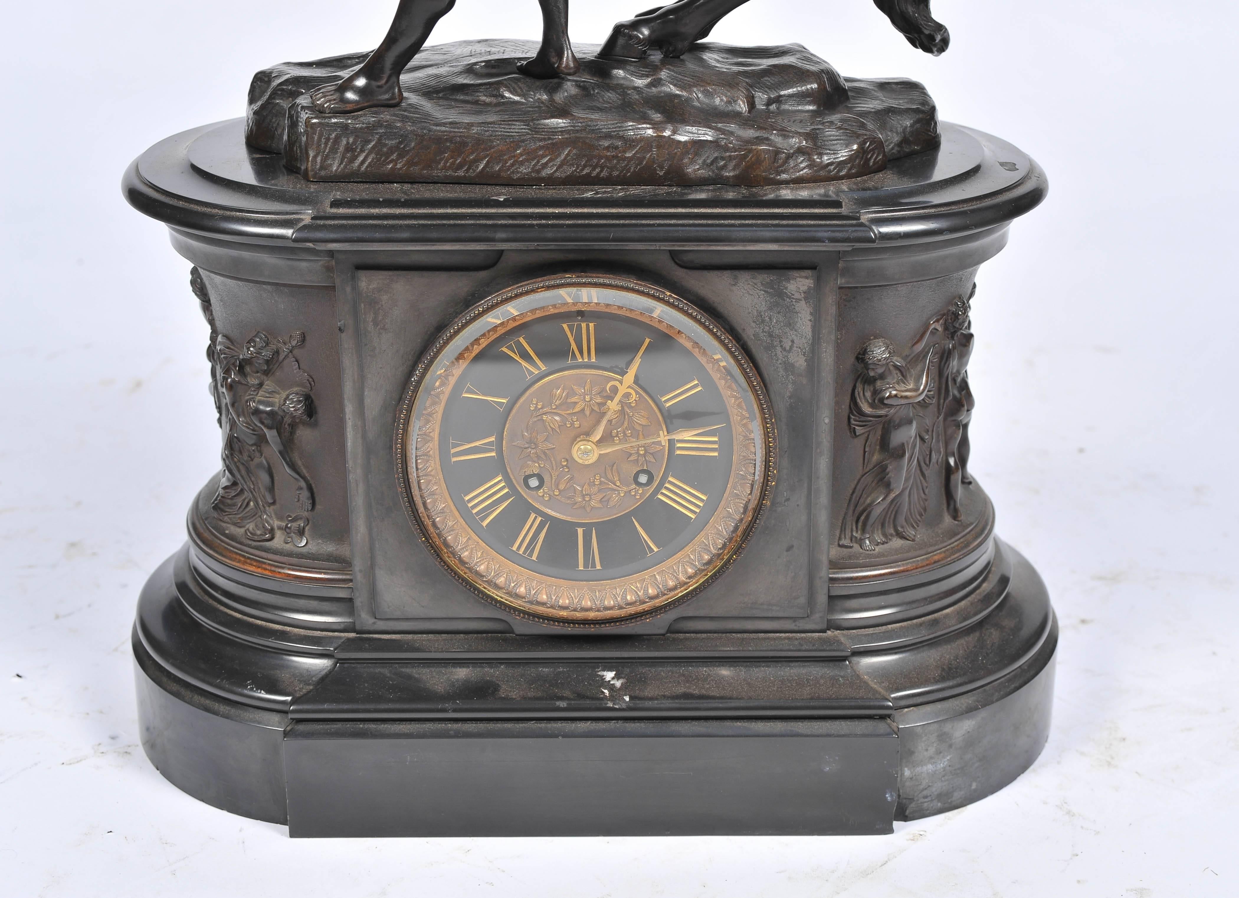 An impressive 19th century black marble and bronze mantel clock, having a classical Marley horse (after Guillaume Coustou the elder 1677-1746.) above.
Bronze plaques to either side depicting classical figures. An eight day chiming clock movement.
 