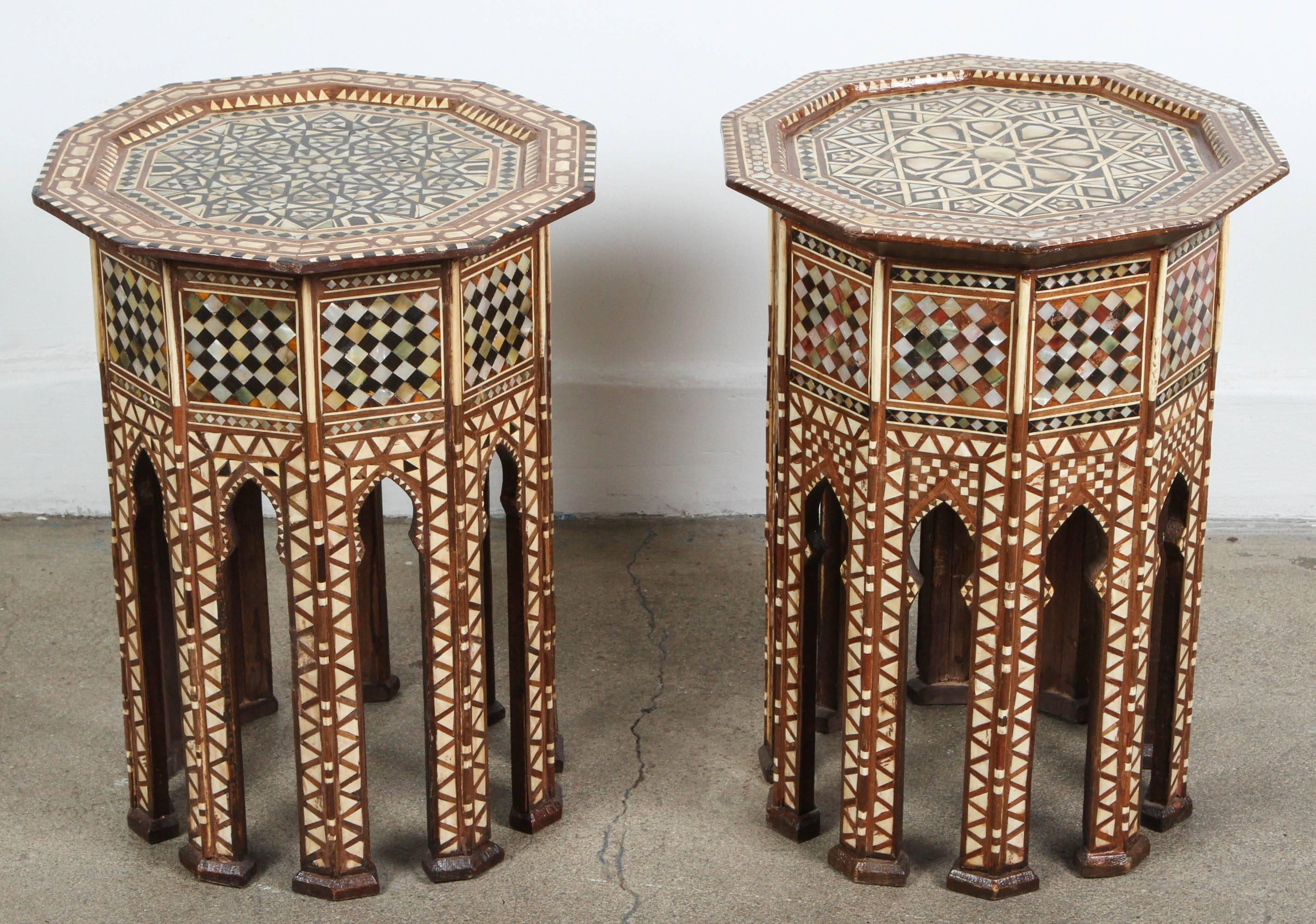 Set of two of Syrian walnut octagonal side tables inlaid with mother-of-pearl, ebony, horn and camel bone.
Moorish arches on the eight sides,
Handcrafted by skilled artisans in the Middle East, Damascus Syria.
Great addition for any Moroccan room