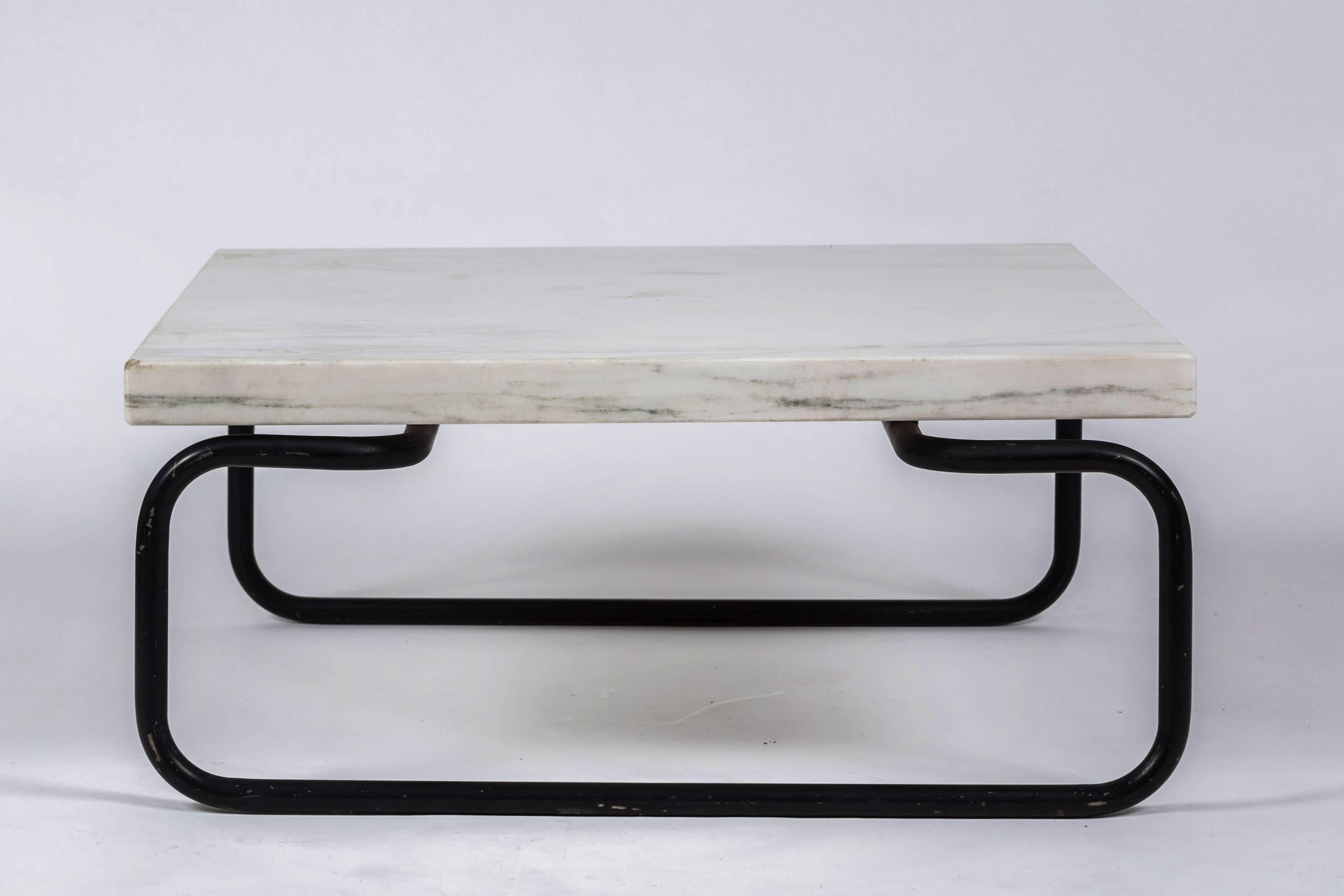 Cocktail/coffee table by Cassina with square white marble top black metal tubular base. Designed by Michael McCarthy for Cassina, 1960s.