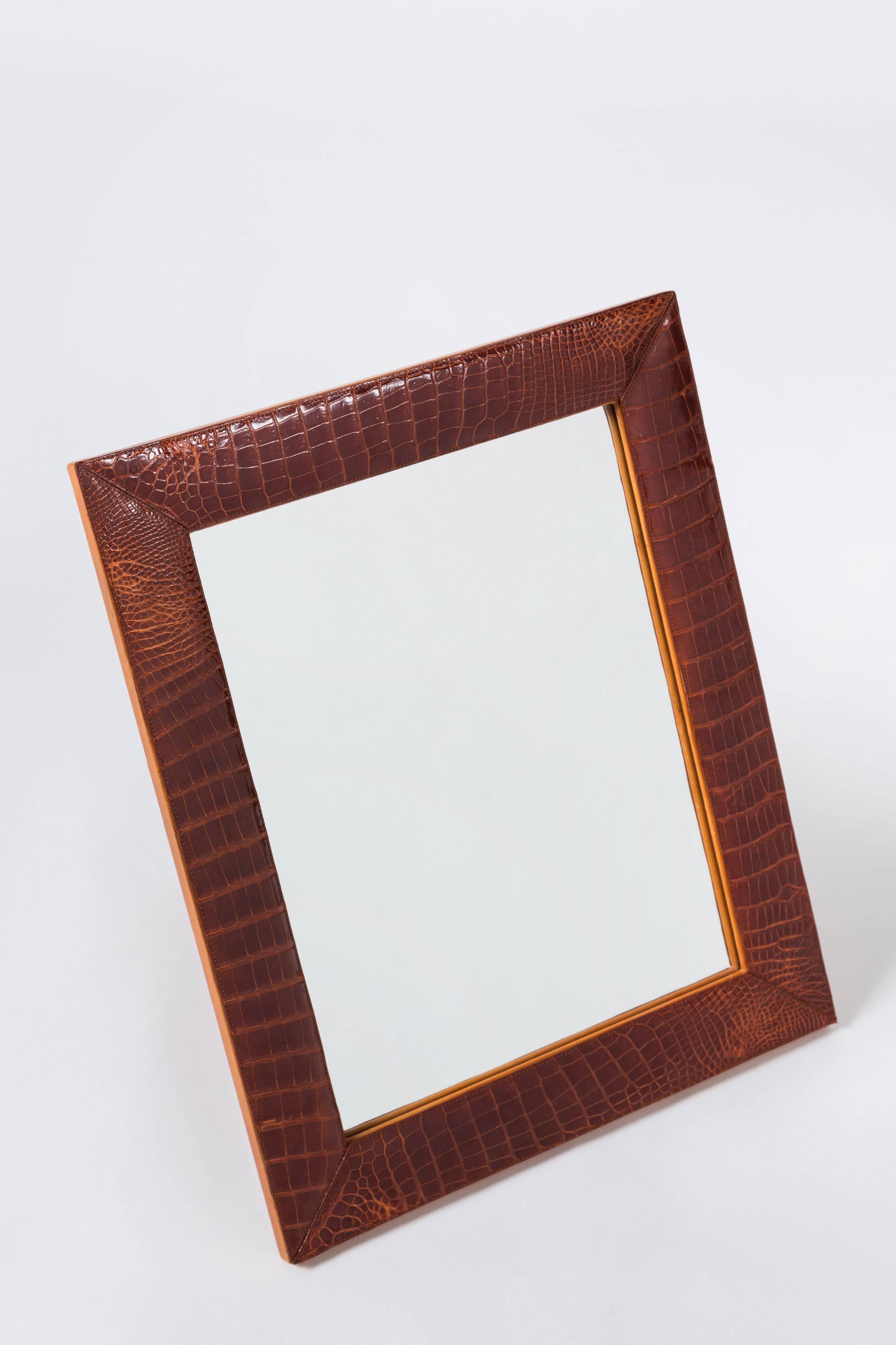 Puruti Beverly Hills tabletop mirror framed in alligator leather. Some warping.