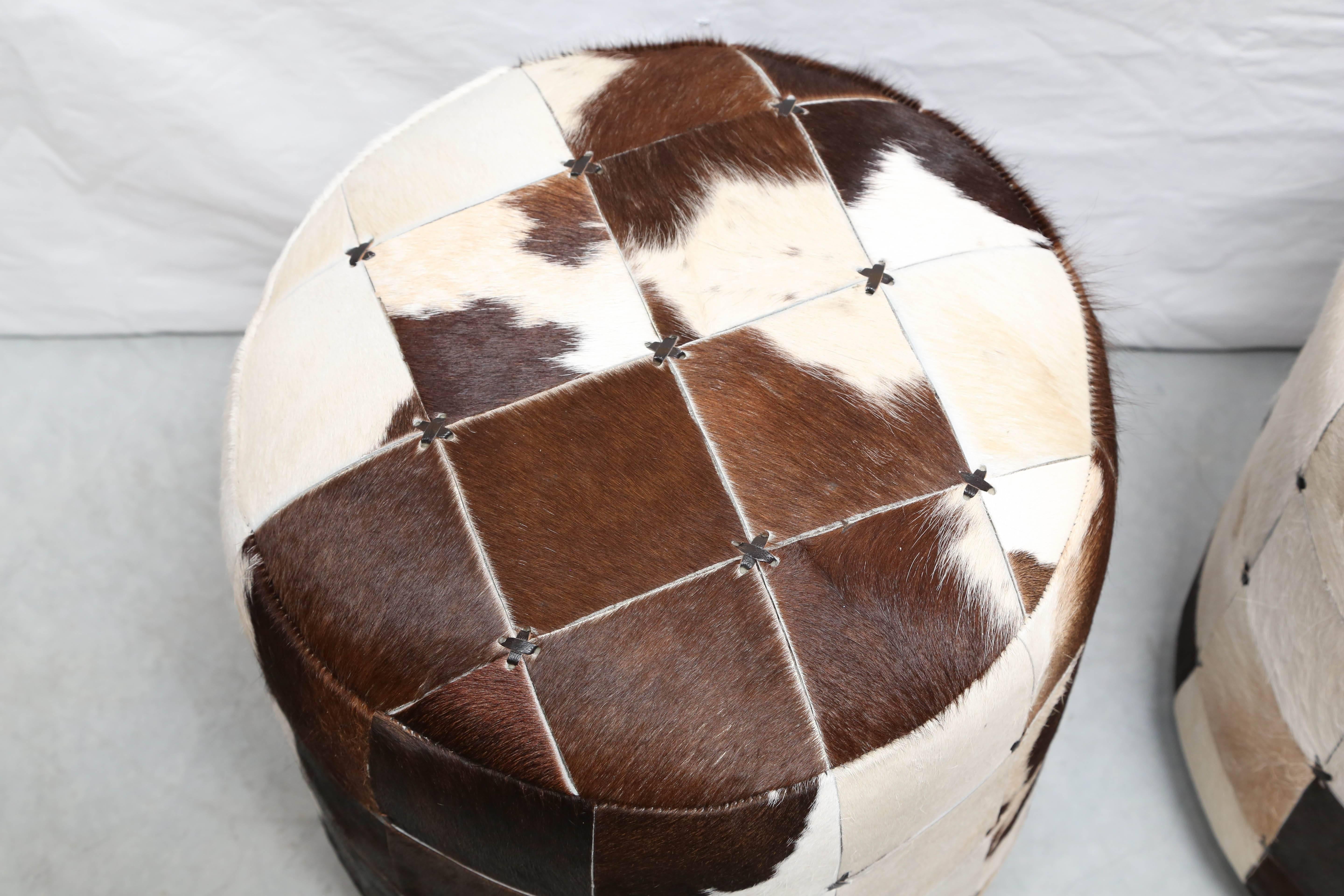 Organic Modern Pair of Cowhide Ottomans or Footstools, Super Chic