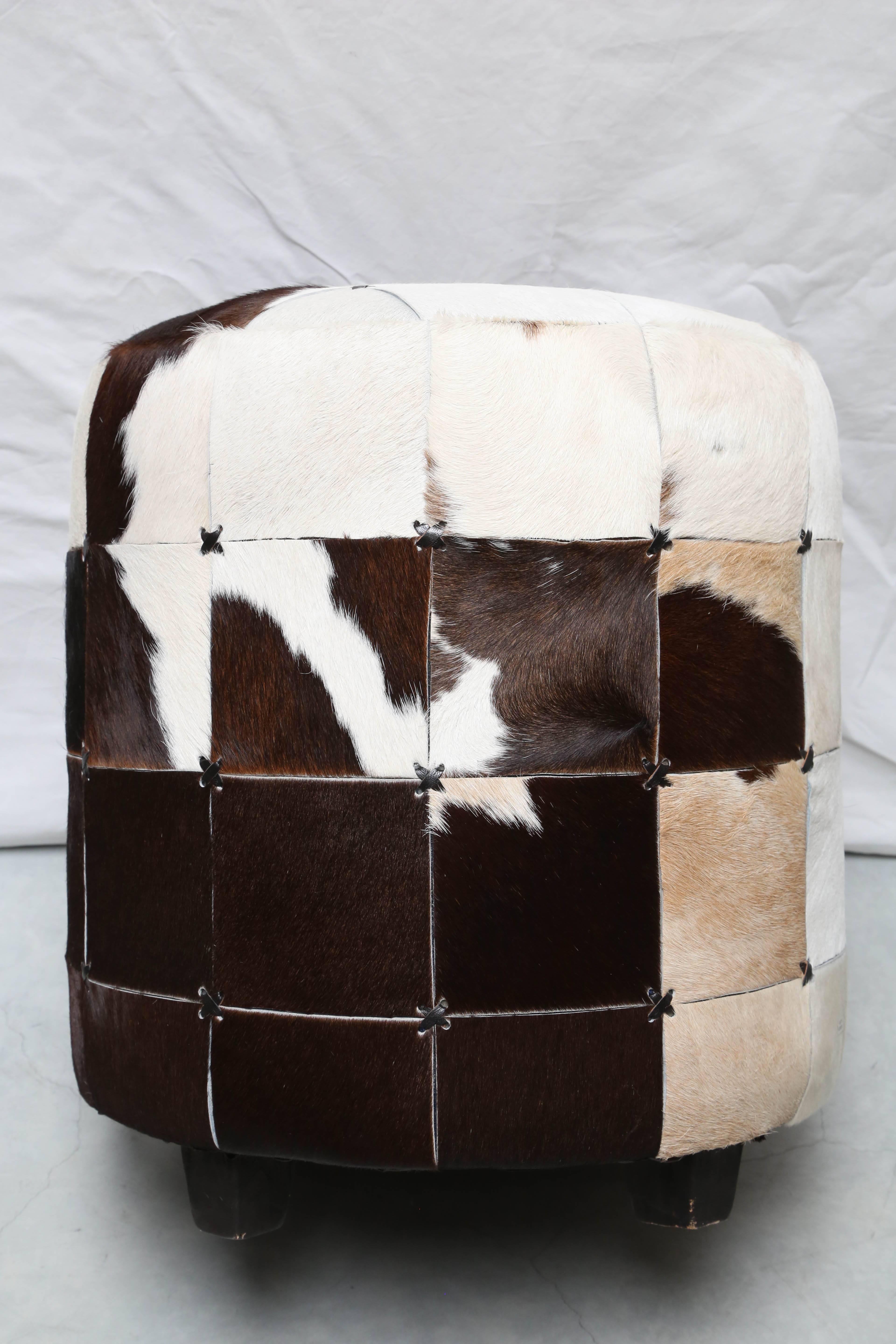 Pair of Cowhide Ottomans or Footstools, Super Chic 1