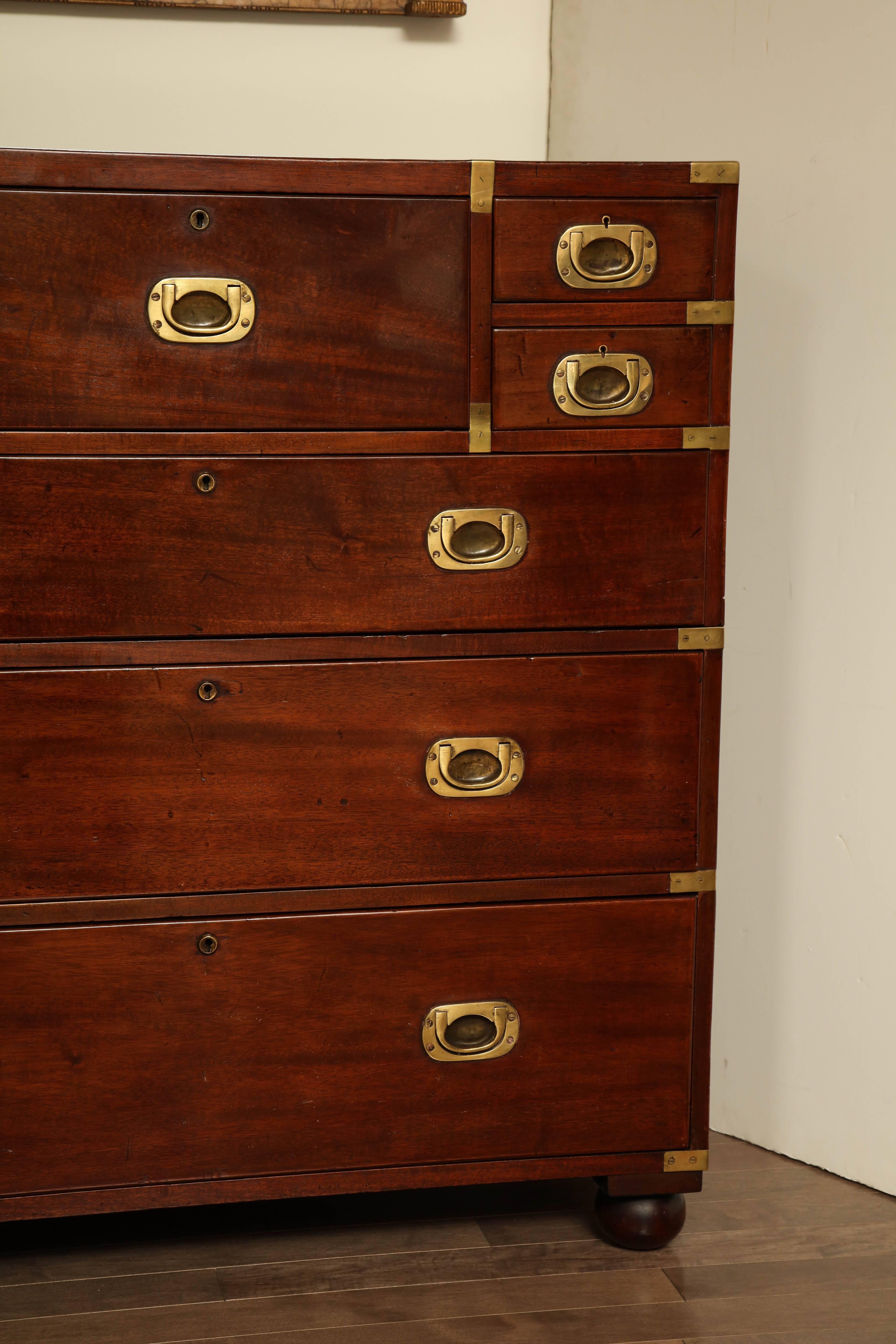 19th Century English, mahogany and brass-mounted campaign chest in two pieces.