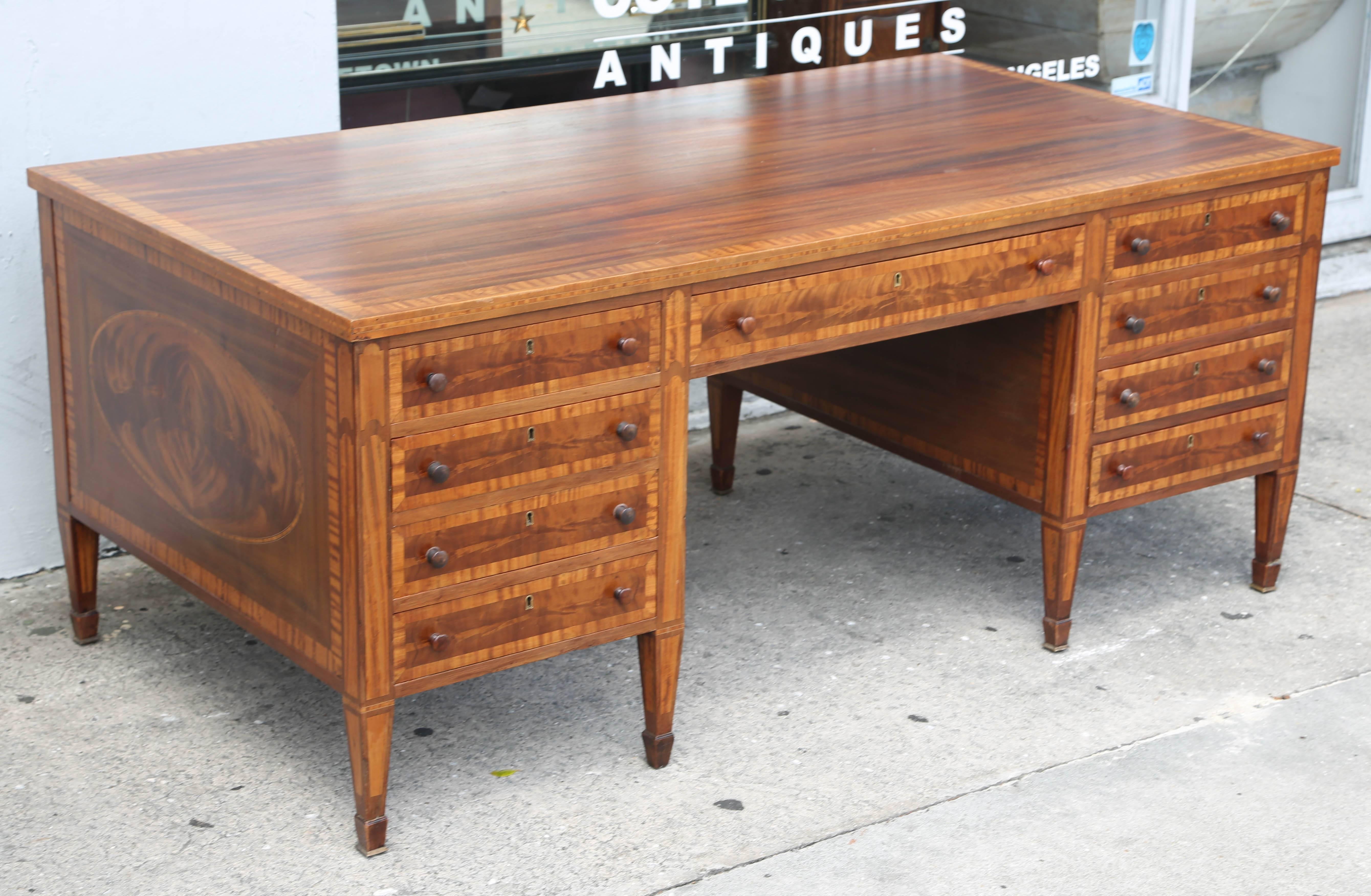 L. Kreiss and sons marquetry partner's desk, early 1900s, nine drawers on each side, inlaid and matched veneers, dovetail joints, labeled L. KREISS AND SONS SAN FRANCISCO, very good condition.
Kreiss were very good cabinet makers in the early