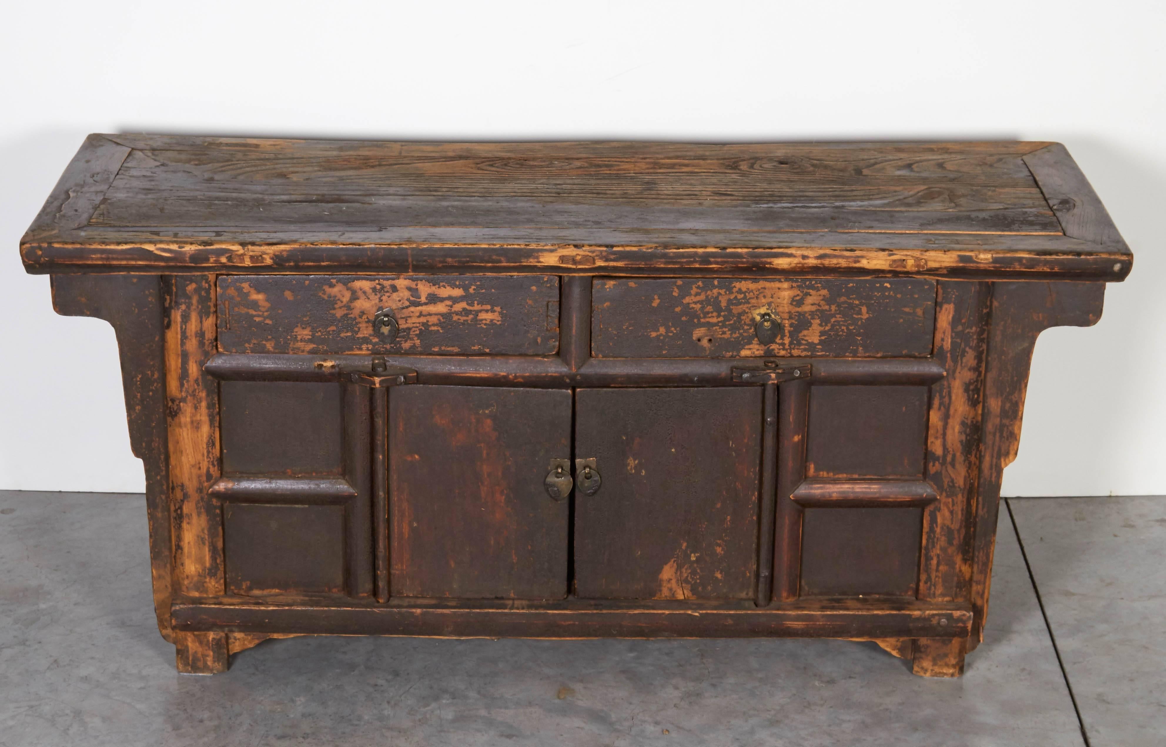 A nicely proportioned 19th century Chinese cabinet, beautifully finished with a warm patina and perfectly suited to be a coffee table or a low entryway piece. This cabinet also works great as a pedestal for displaying a Buddha or other object. From