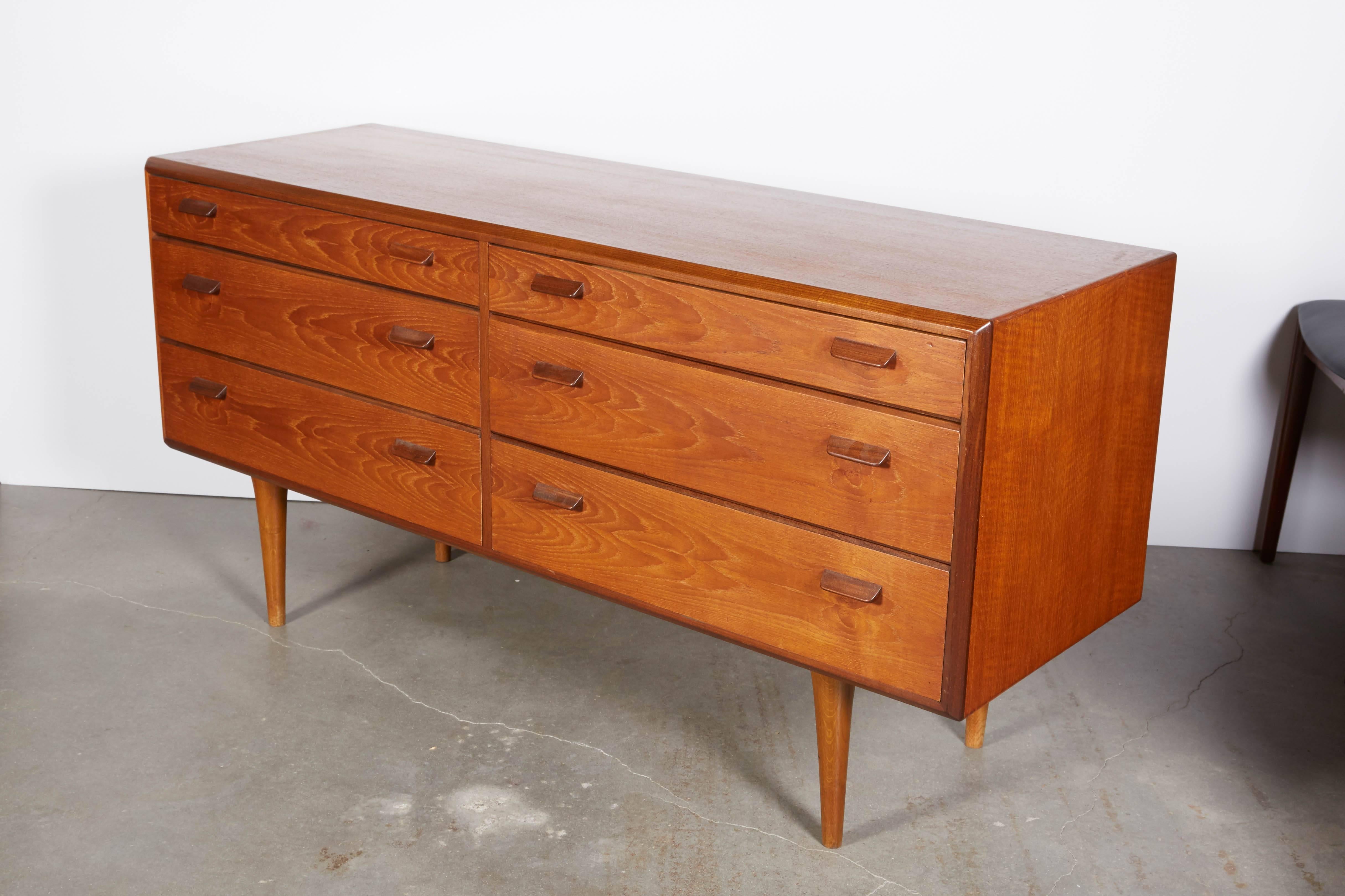 Vintage 1950s Poul Volther Teak Dresser

This Danish low dresser is in excellent condition. The to drawers are lined with felt for watches, and jewelry. Can also be used in a dining room, or for media storage. Ready for pick up, delivery, or