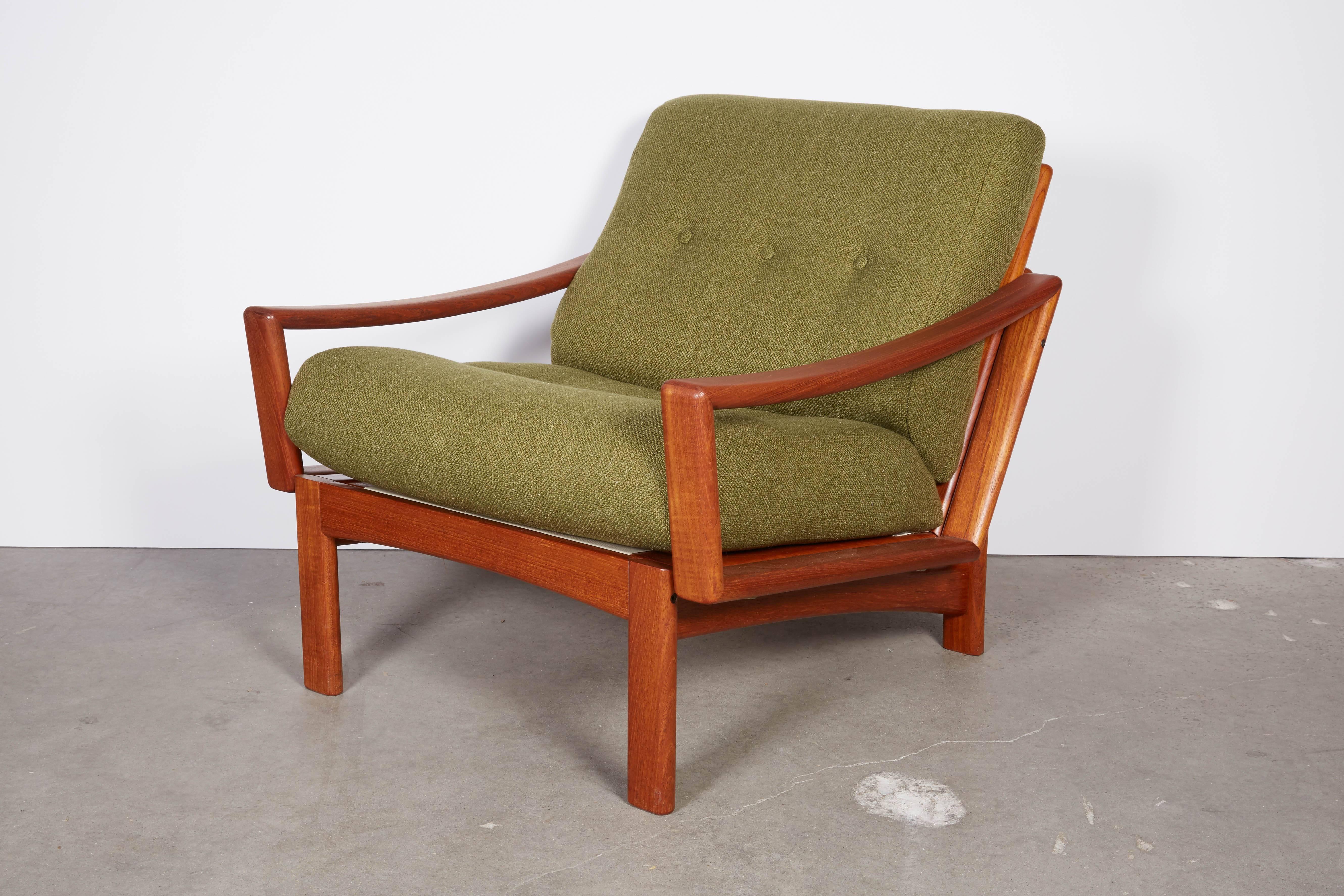 Danish 1960s Teak Arm Chair

This Modern club chair is in excellent condition. The cushions are this amazing shape that gives the best lumbar support I've ever experience. Newly upholstered, or send in your fabric you would like to see it in. Labor