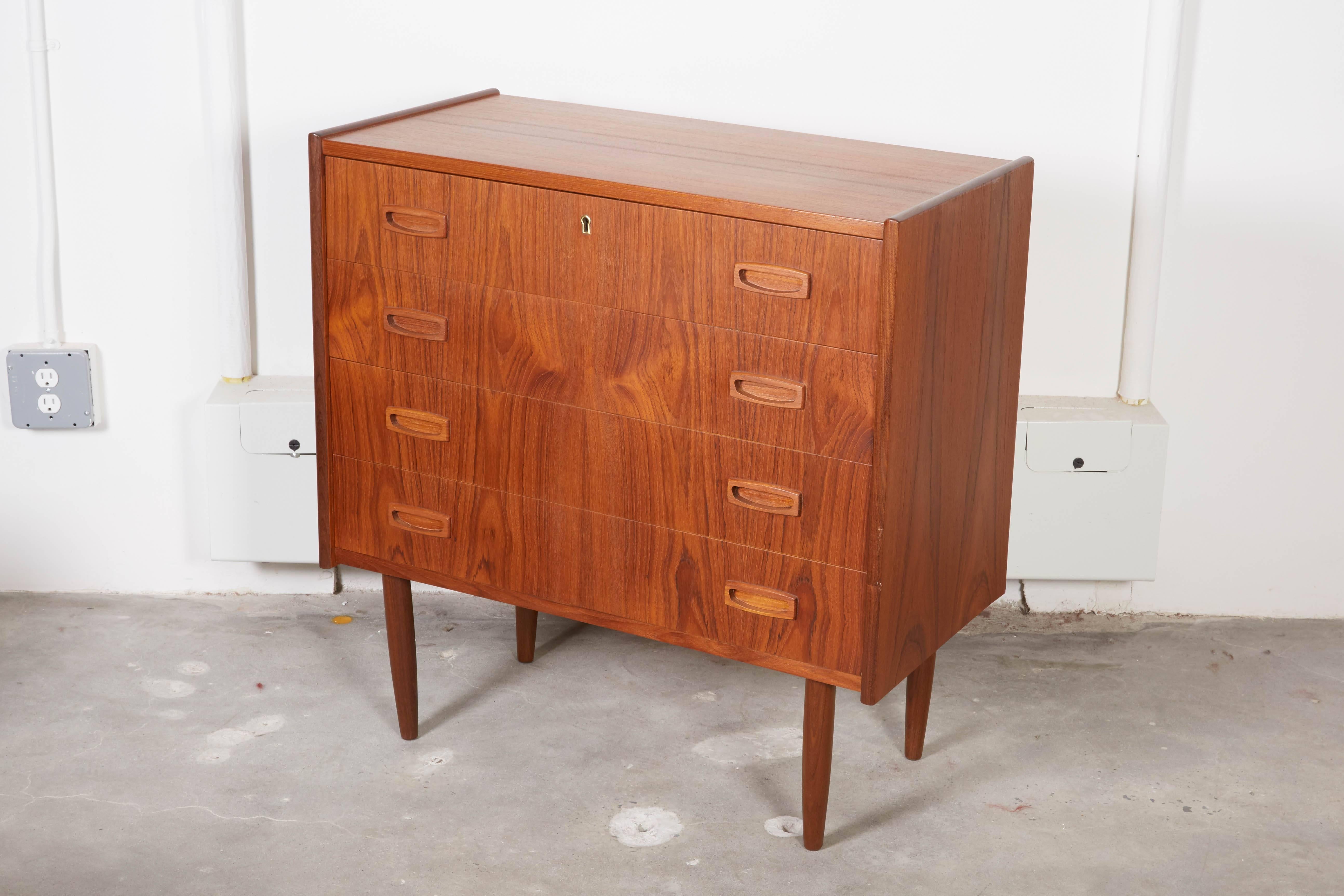 Vintage 1960s Teak Dresser

This Danish 4-drawer dresser is in excellent condition and can be in many parts of the home and office. A great piece in a bedroom as a dresser or large night stand or as a piece in the entry way. Maybe in the hallway for