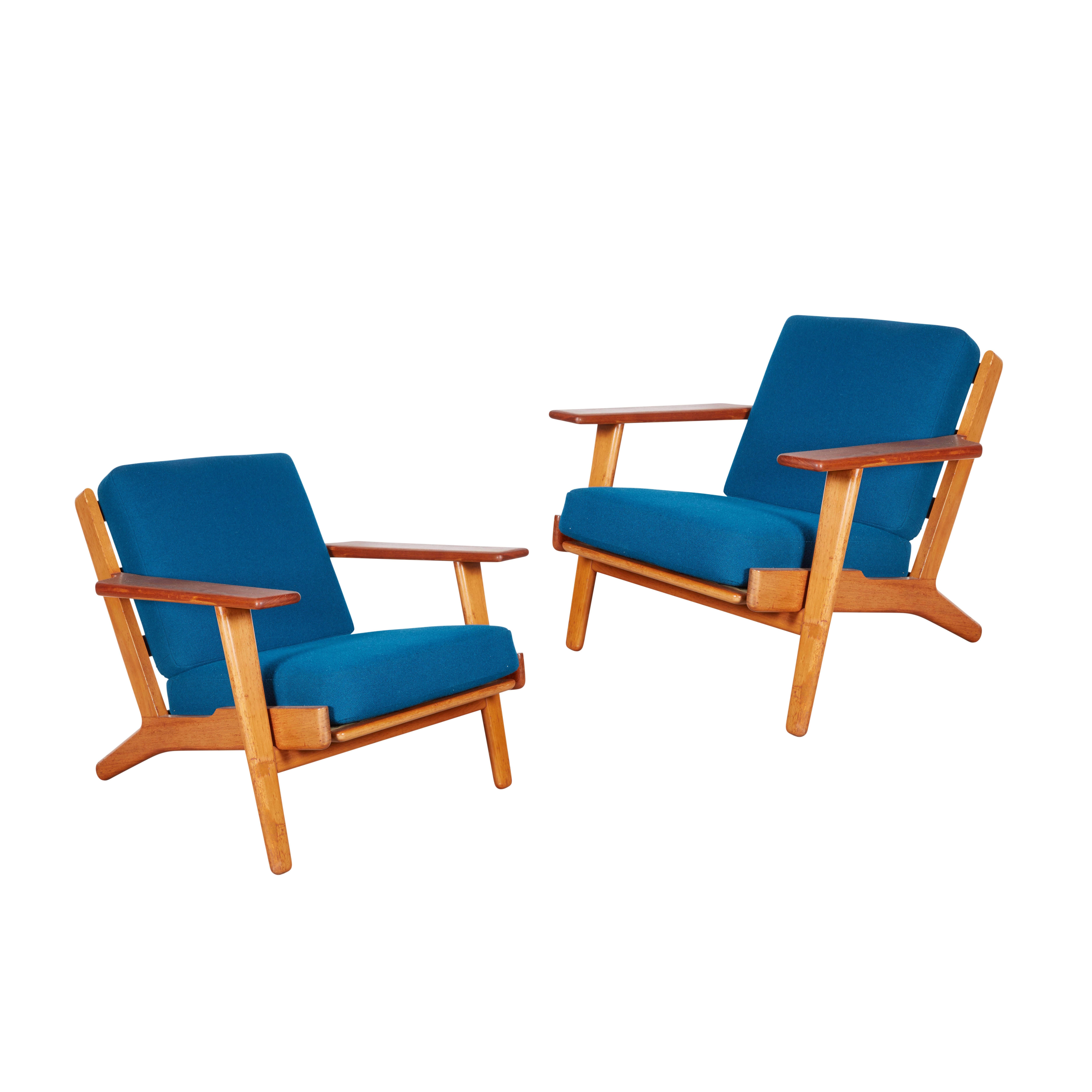 Vintage 1950s Hans Wegner Teak Chairs

These chairs are in excellent condition and has the original fabric which is also in wonderful condition. Cushions have springs. Ready for pick up, delivery, or shipping anywhere in the world.