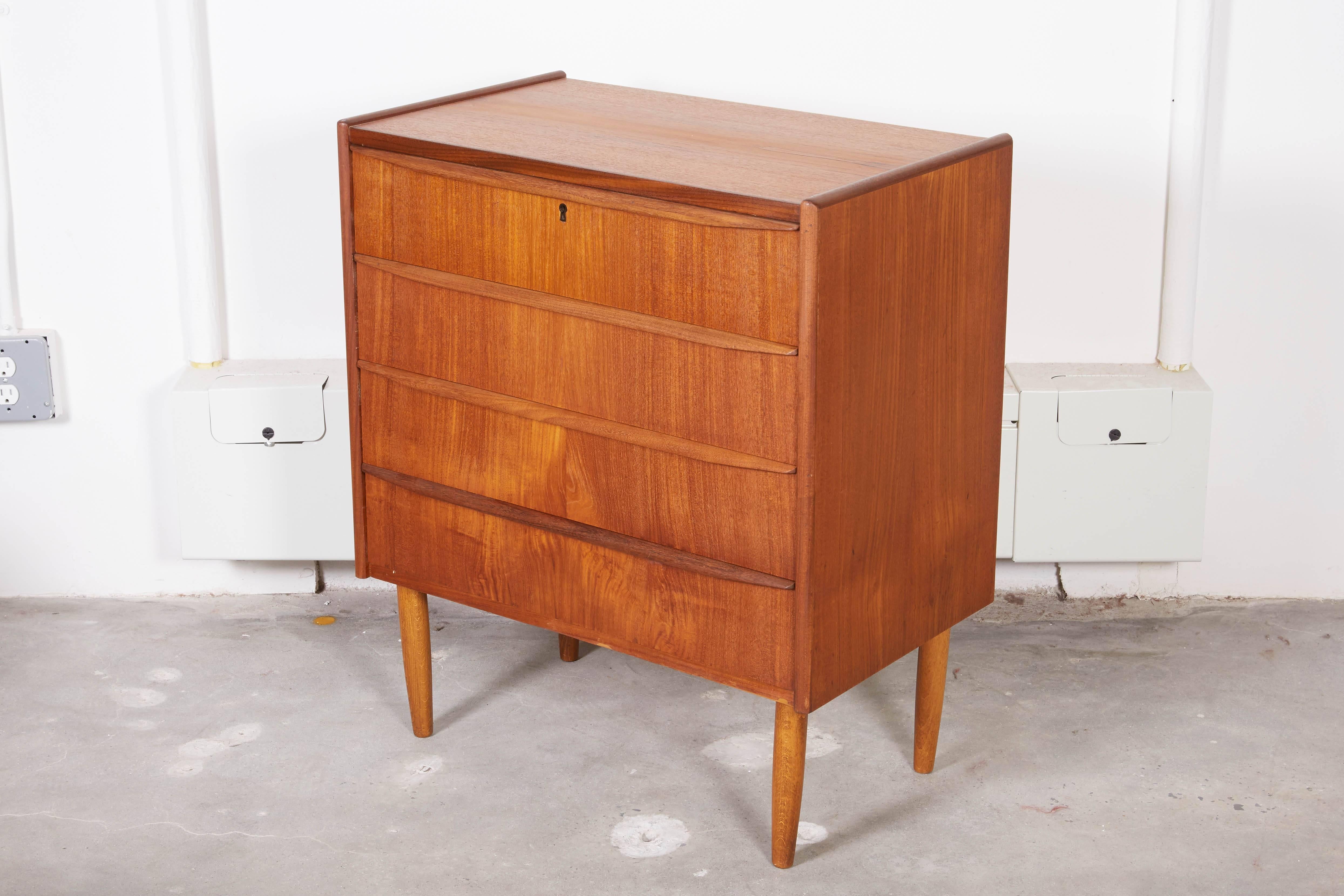 Vintage 1960s Teak Dresser

This Danish 4-drawer dresser is in excellent condition and can be in many parts of the home and office. A great piece in a bedroom as a dresser or large night stand or as a piece in the entry way. Maybe in the hallway for