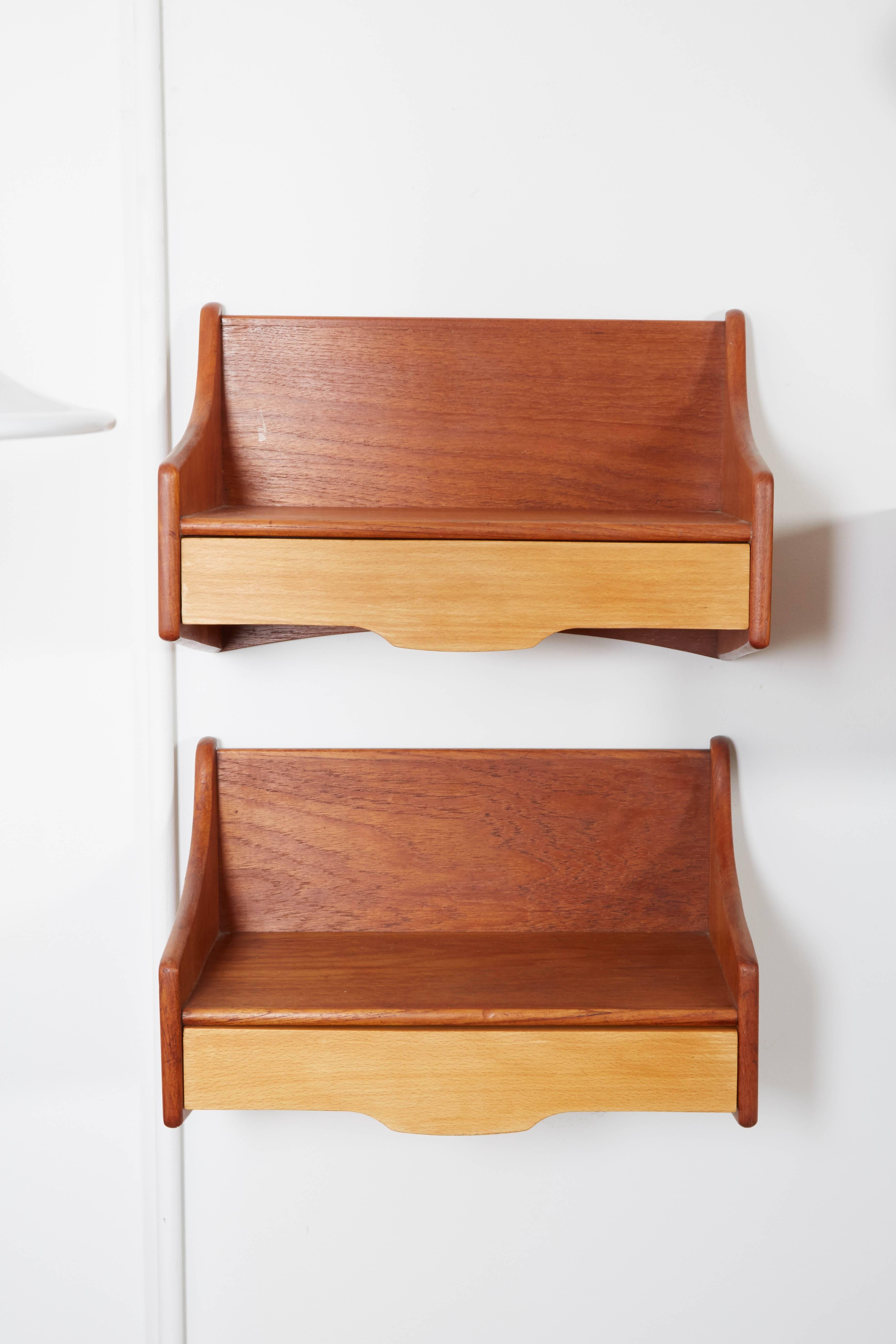 Vintage 1950s Wall Nightstands by Bender Madsen, Pair

These minimal wall shelves are in excellent condition. Intended to be wall mounted night stands, but obviously can be used in any part of the home anywhere you need a shelf. The drawer makes it