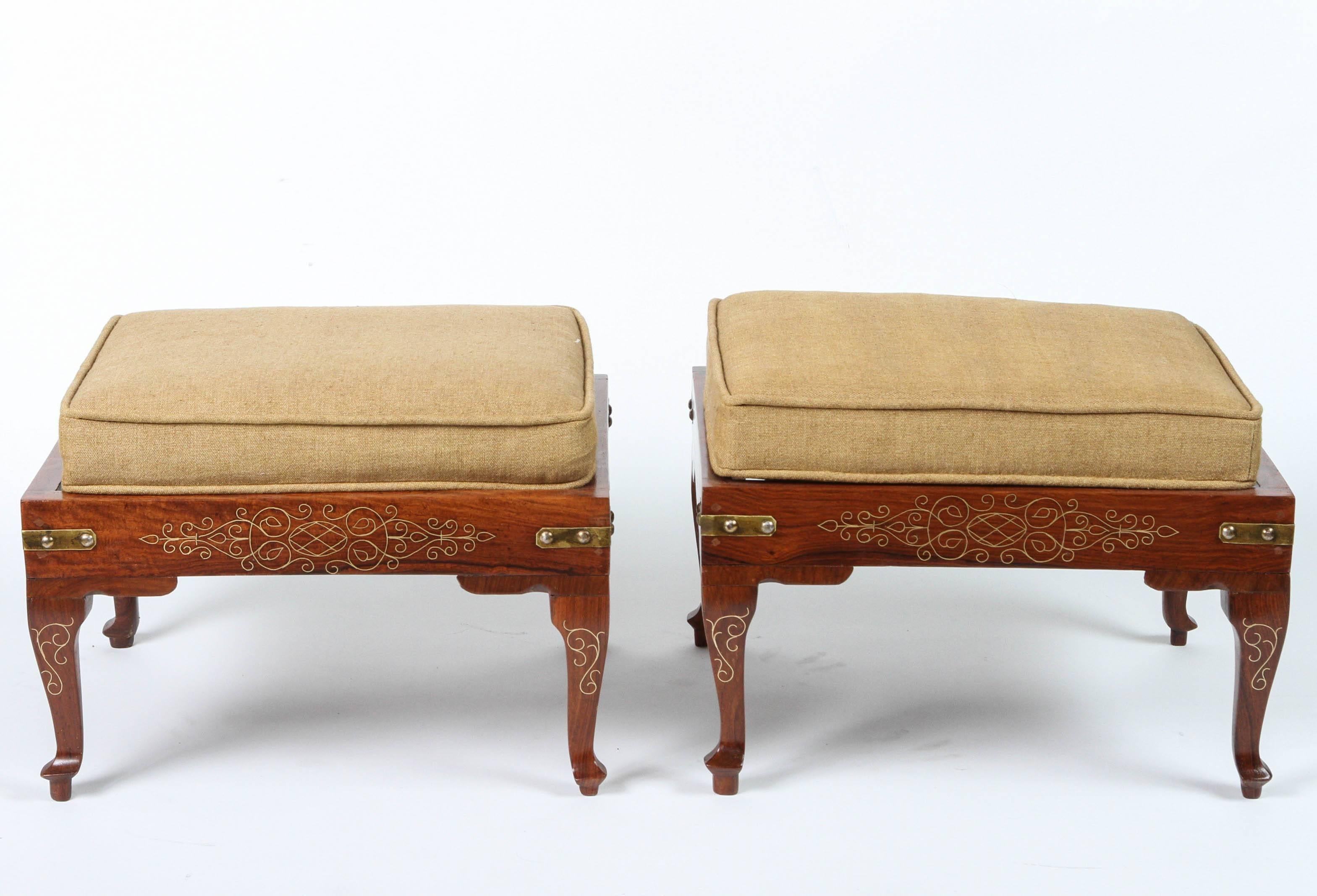 Pair of vintage rosewood footstools with inlay brass details and custom-made linen cushions newly refinished.