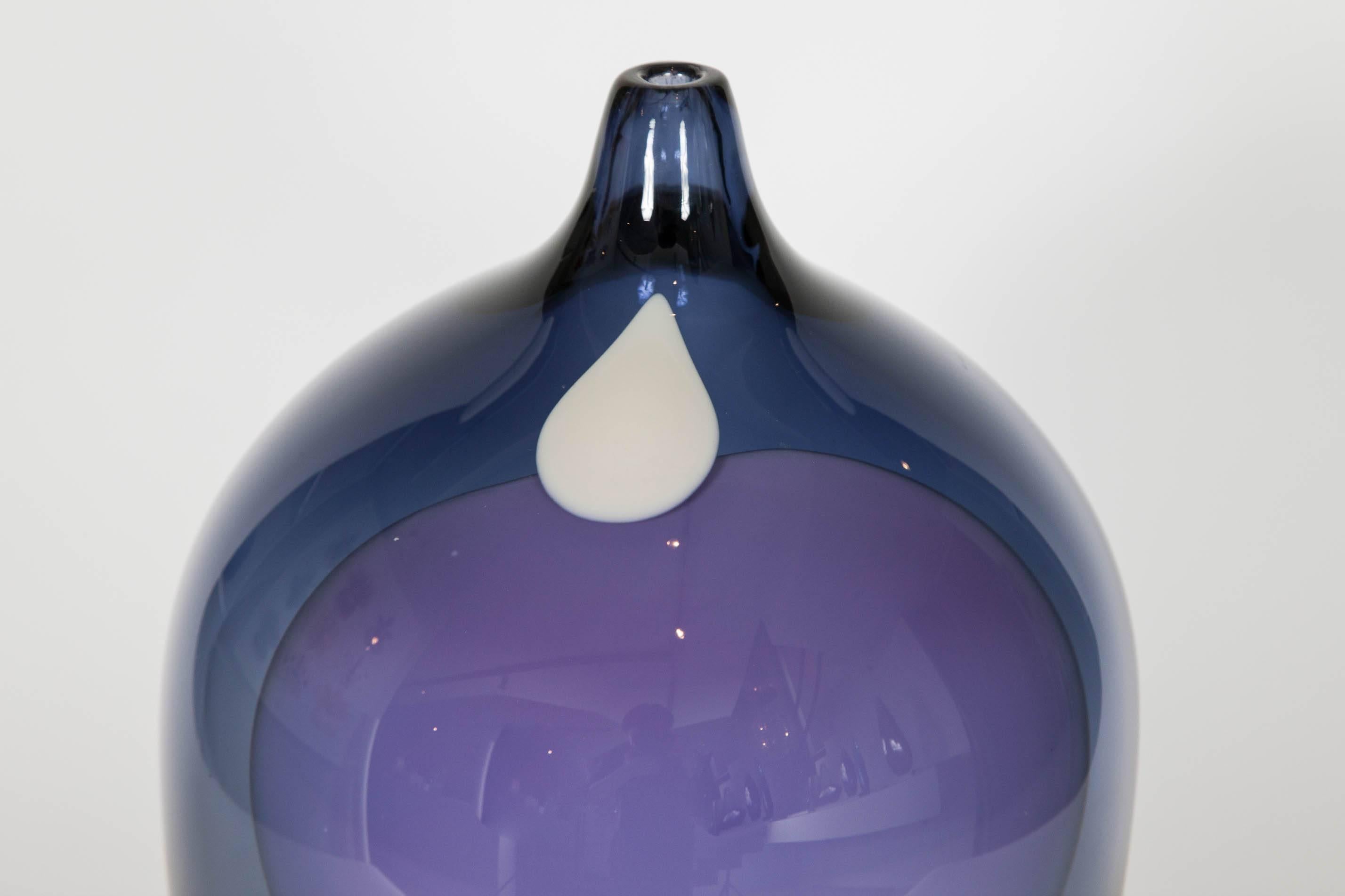 Melobesia is a unique handblown glass vessel from the Hortus Poetica Collection by the Swedish artist Gunnel Sahlin. Soft, sensual forms are blown with abstract additions of complementary hues. Treating the glass as a canvas, the colours sit in