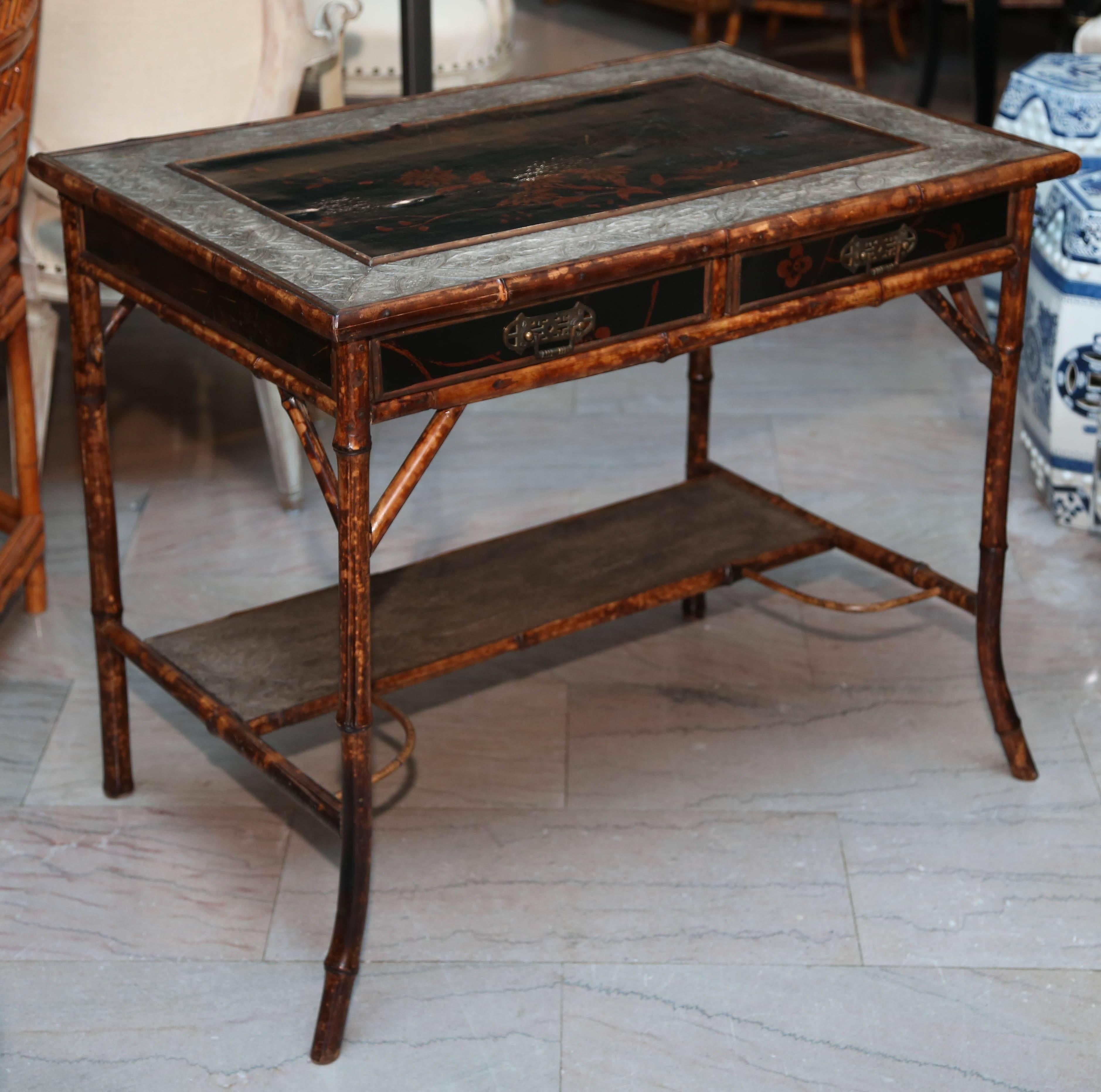 Japanned top and shelf accent this elegant Edwardian example -fitted with drawers.

 