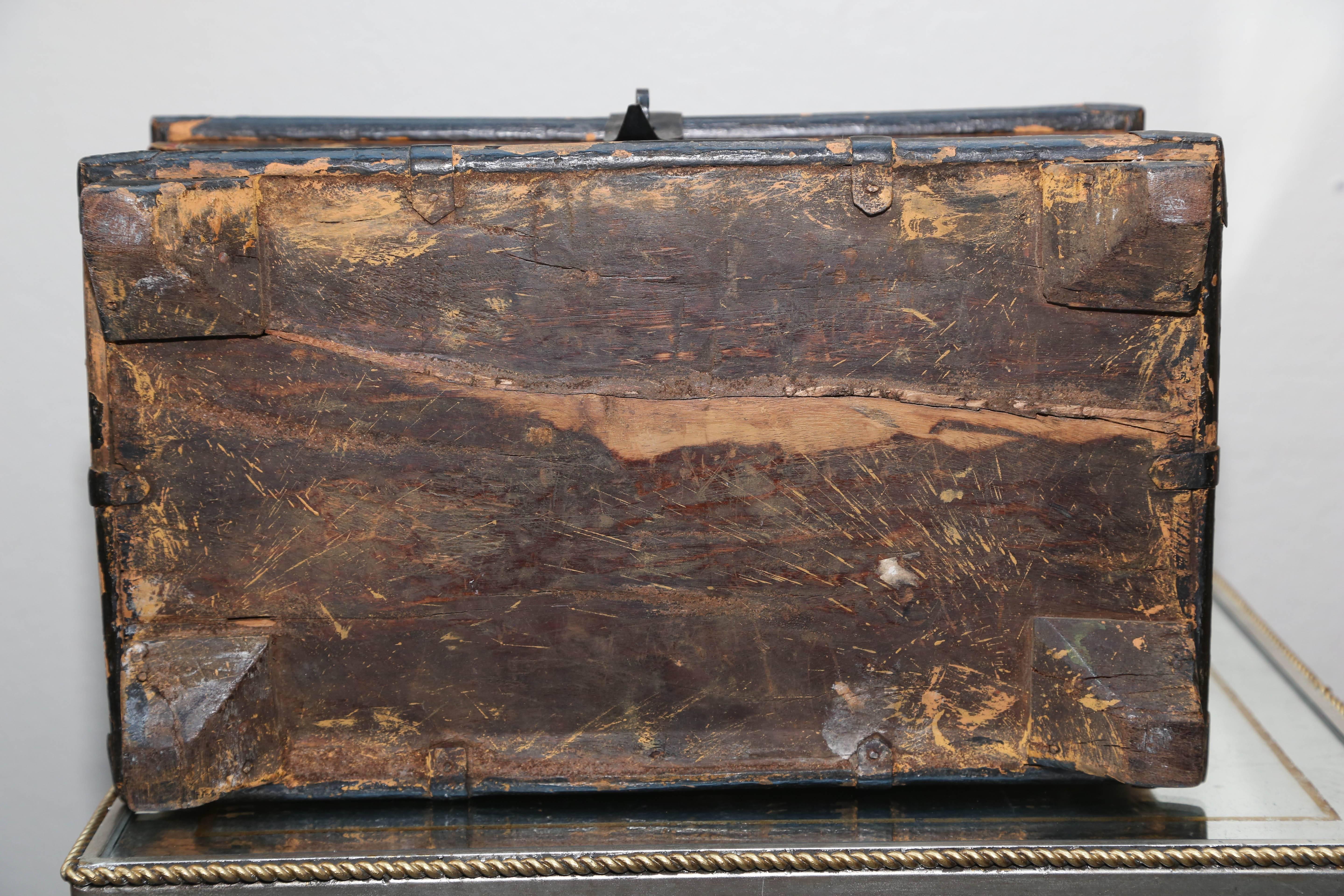 Hand-painted and crafted with a central figure of Ganesha and hand-forged iron appointments.