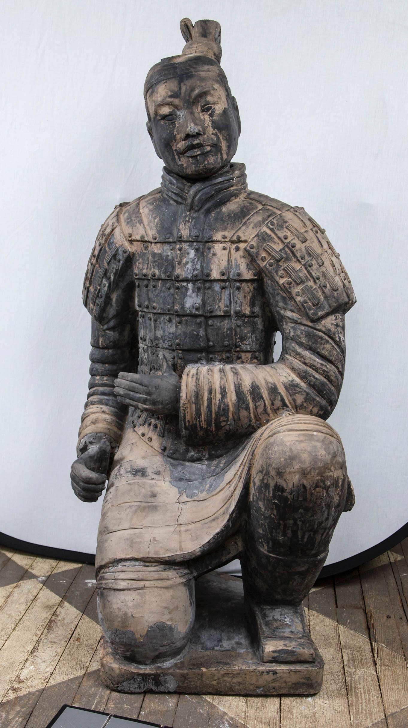 Now you can start your own collection of Chinese warriors, like the ancient Emperor.
He is a later copy, of course, He wears a full suit of armor and is in a kneeling position. His head is a separate piece. The discolorizations are intentional, to
