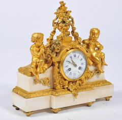 Pendule de cheminée ancienne de style Louis XVI:: Raingo Frères:: Paris