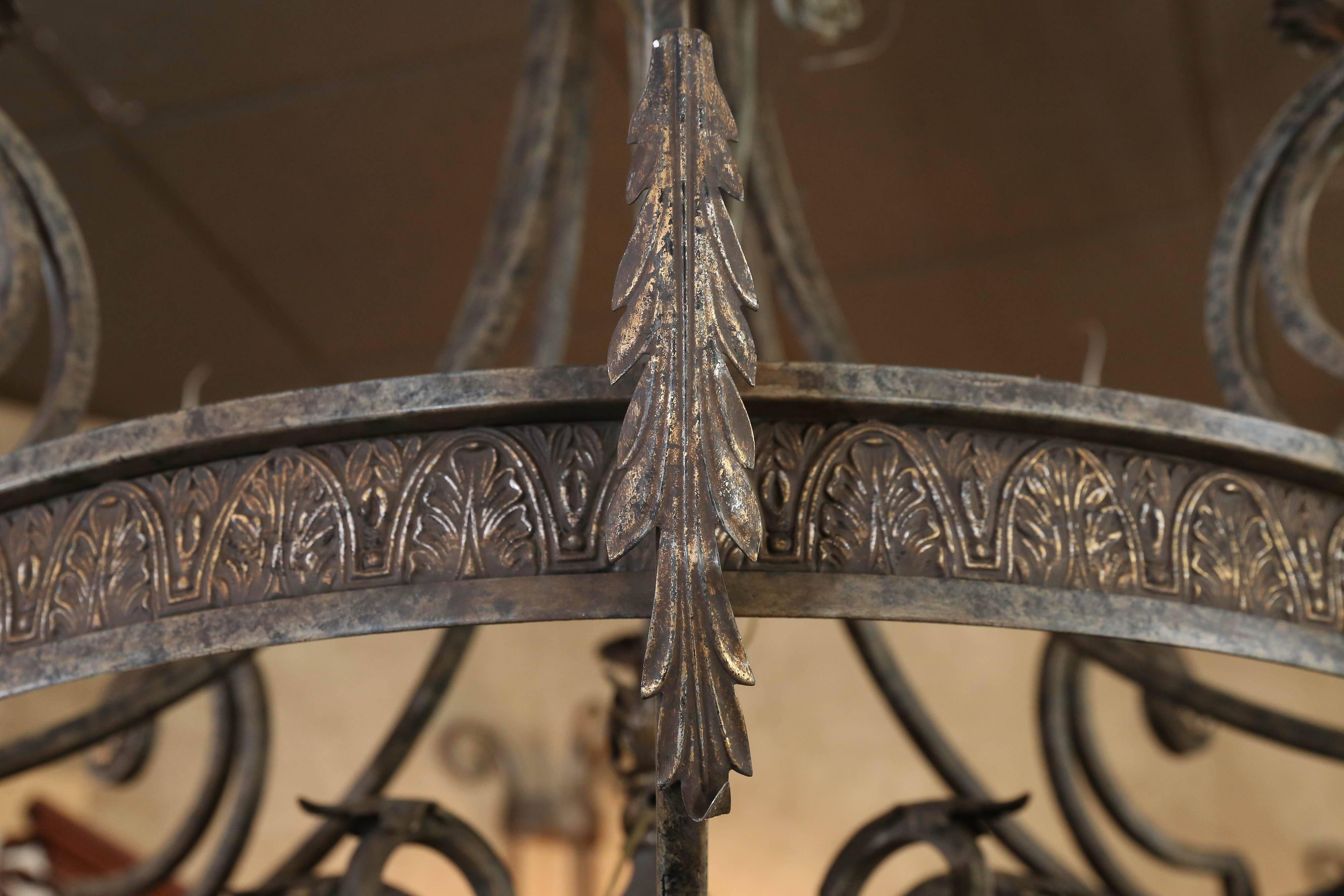 American  Pair ofLarge  Iron Chandeliers  accented with pale gilt highlights 