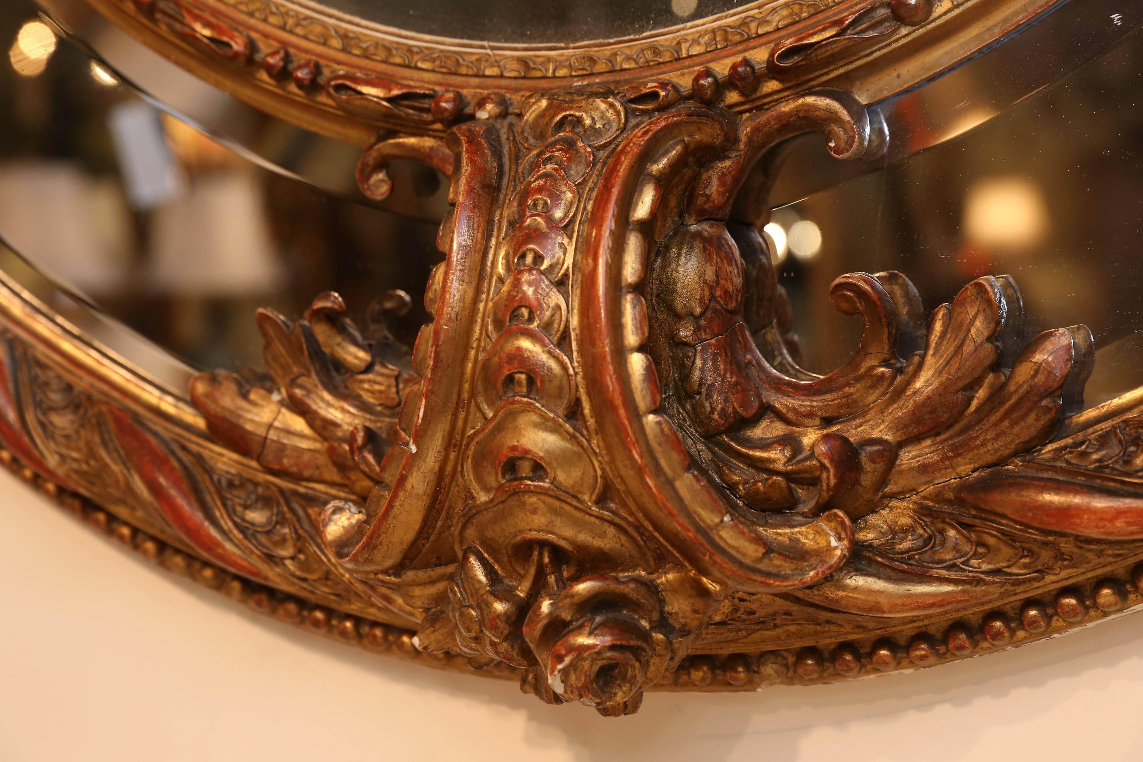 XIXe siècle Grand miroir ovale français en bois doré avec miroirs biseautés, 19ème siècle en vente