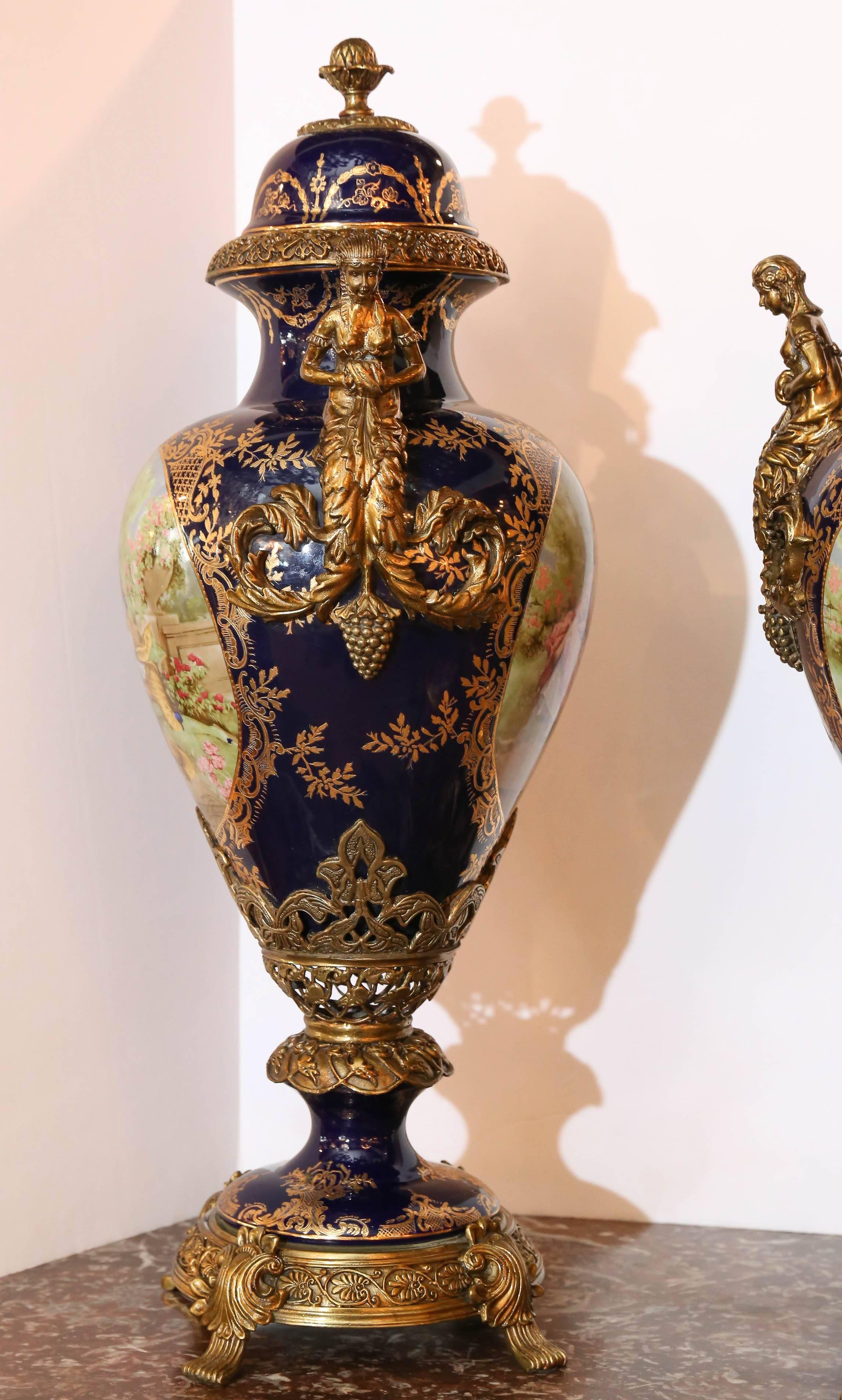 Pair of Large Porcelain Lidded Urns, Bronze Mounted and Gilt Decorated In Good Condition In Houston, TX