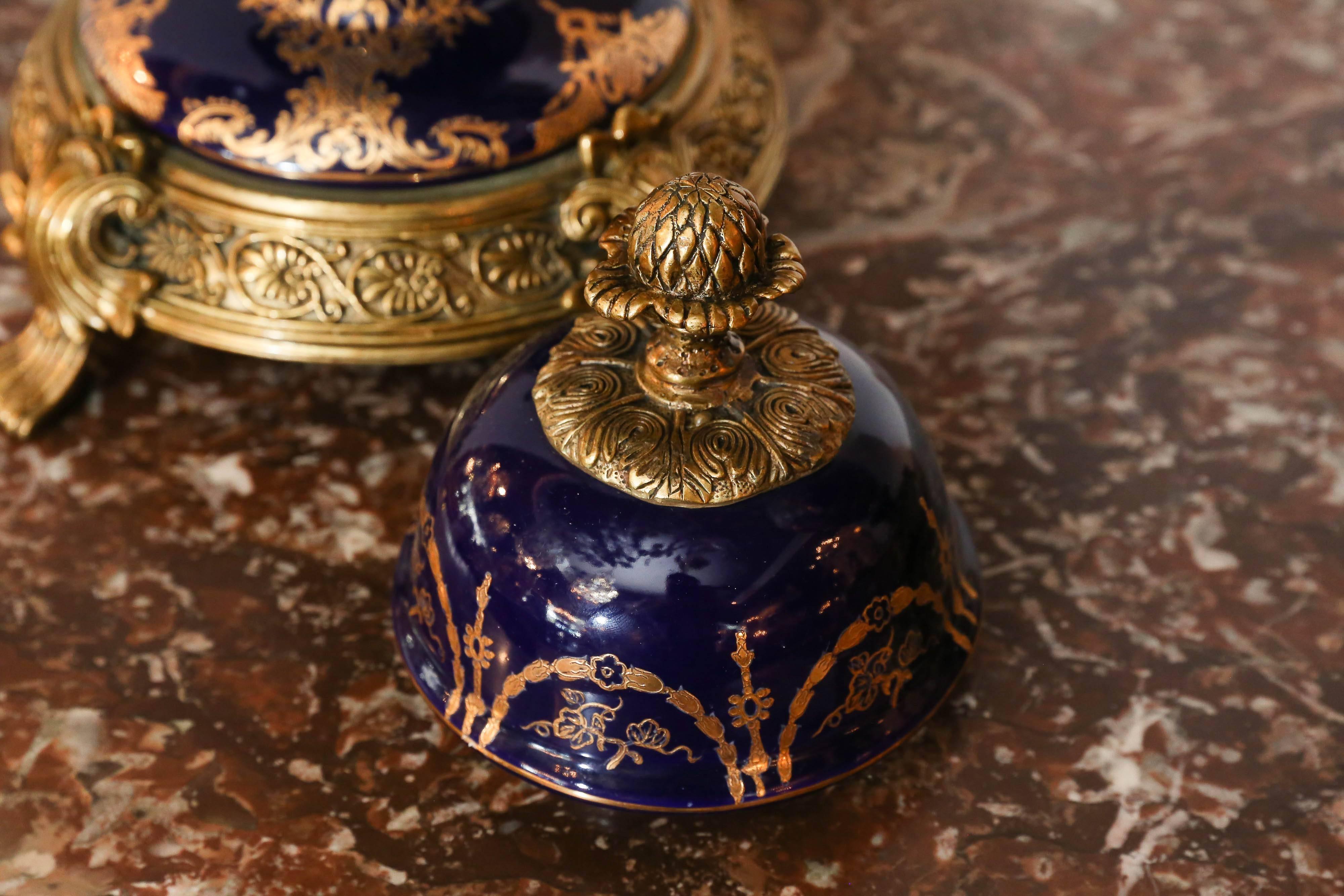 Pair of Large Porcelain Lidded Urns, Bronze Mounted and Gilt Decorated 3
