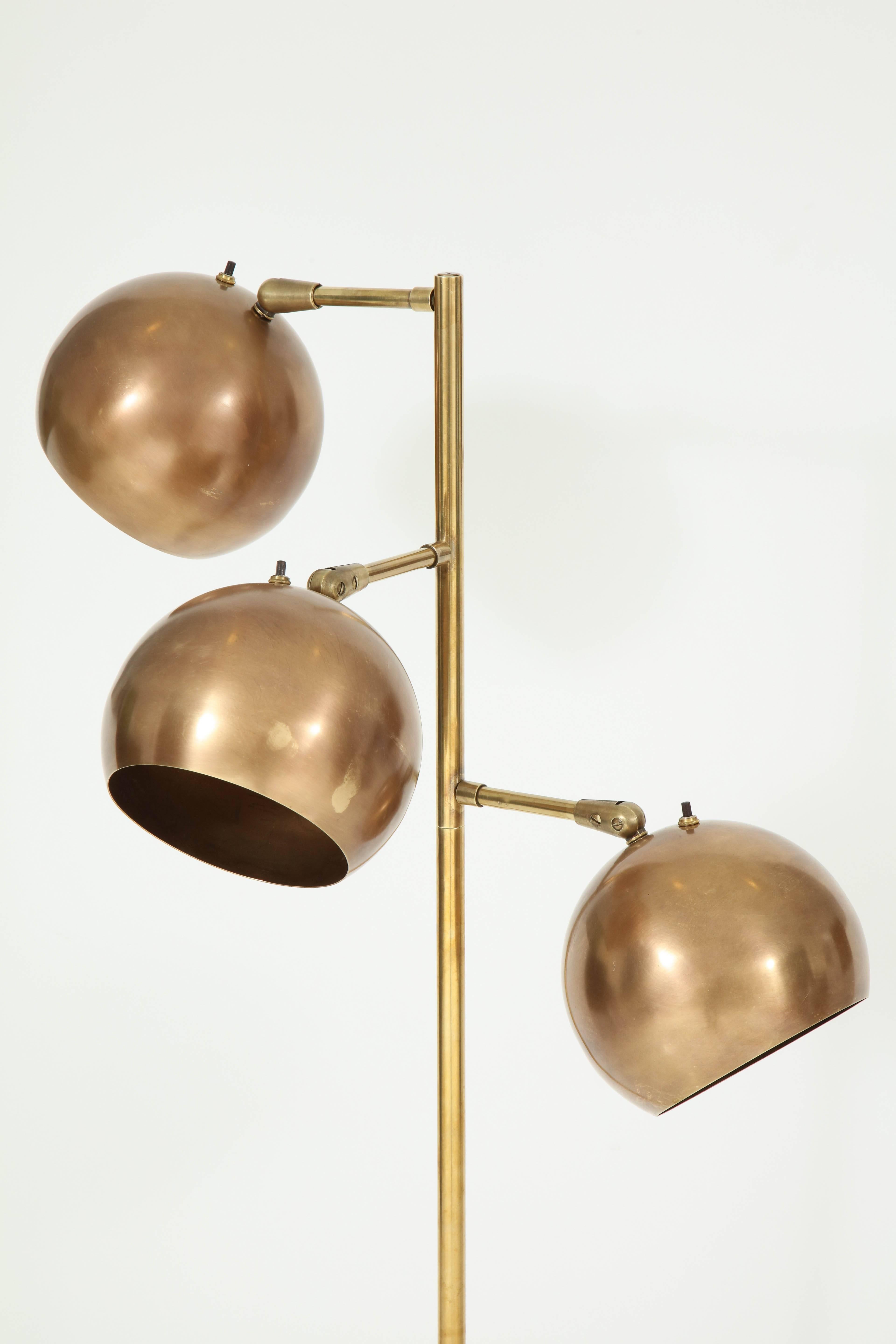 Elegant three orb floor lamp by Kovacs, patinated brass, rewired.