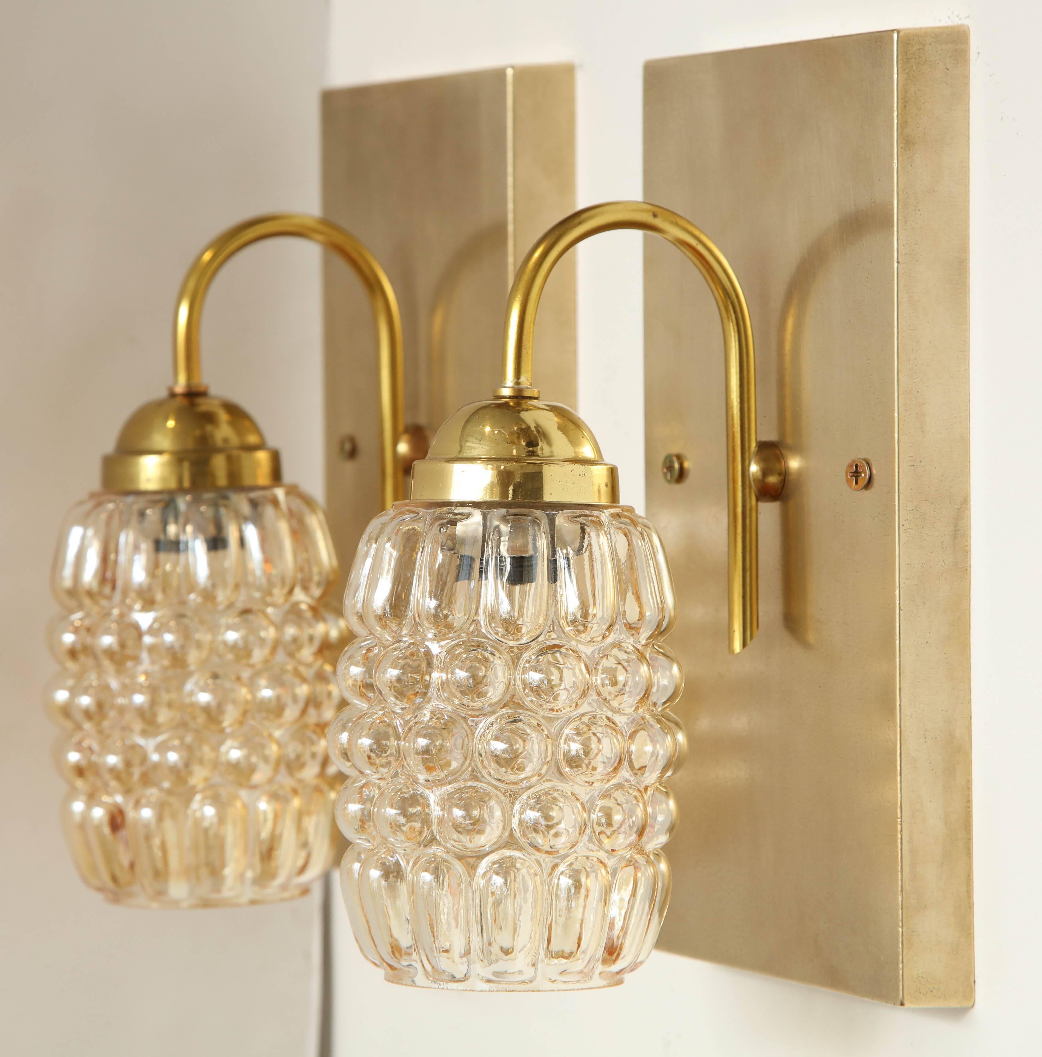 Pair of Champagne bubble glass sconces by Limburg.
The sconces have been newly rewired for the US and each take a candelabra 
light bulb.