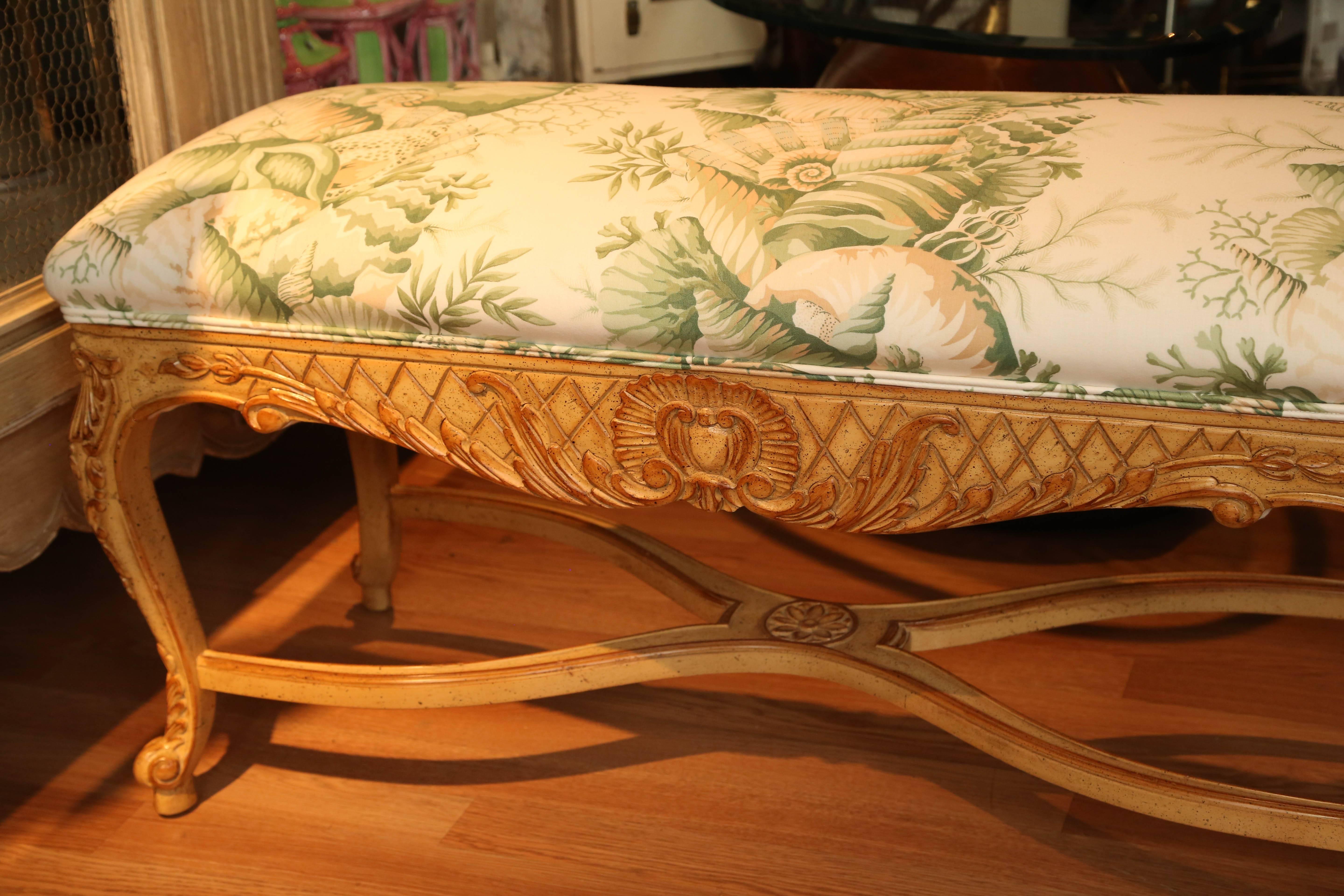 Stunning country French bench upholstered in chintz fabric with sea shell motif.