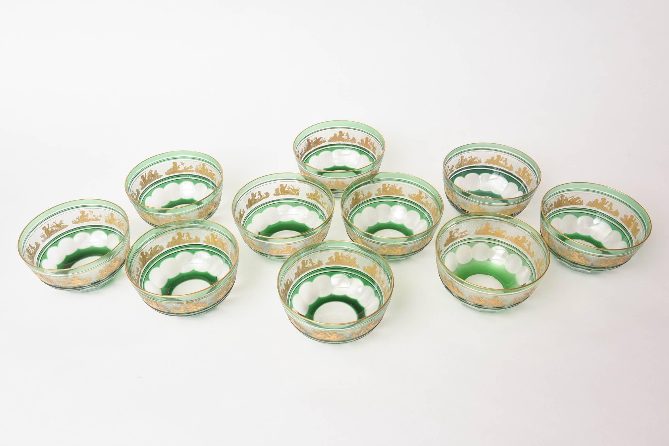 A classic and elegant pattern from the storied Belgium manufacturer. The gilded figures are on a finely done acid etched background and the green glass is crisply cut to the clear. A heavy weight and a nice size make these pieces very versatile.