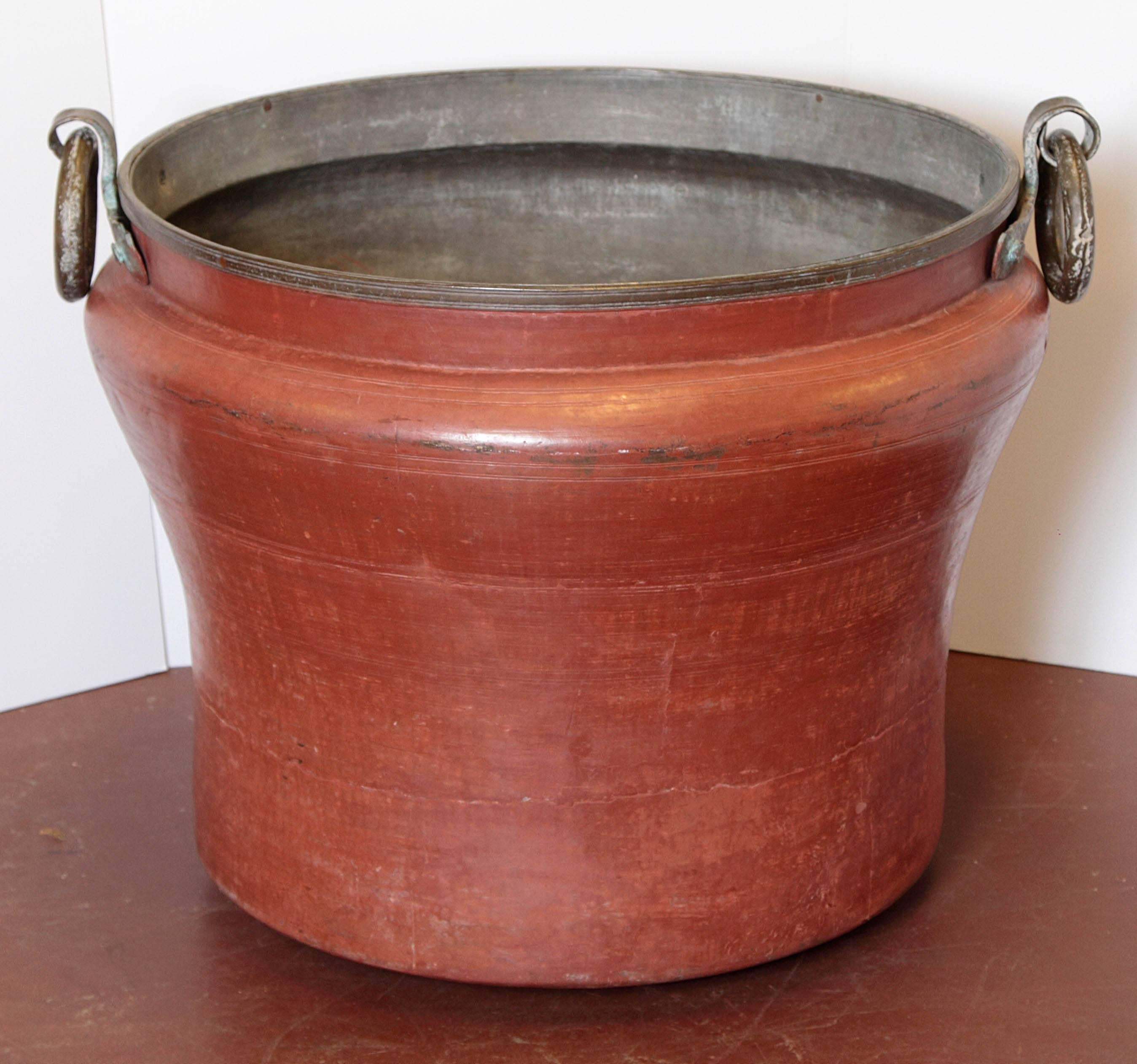 Massive copper pot with hand-forged handles. Tin lined.