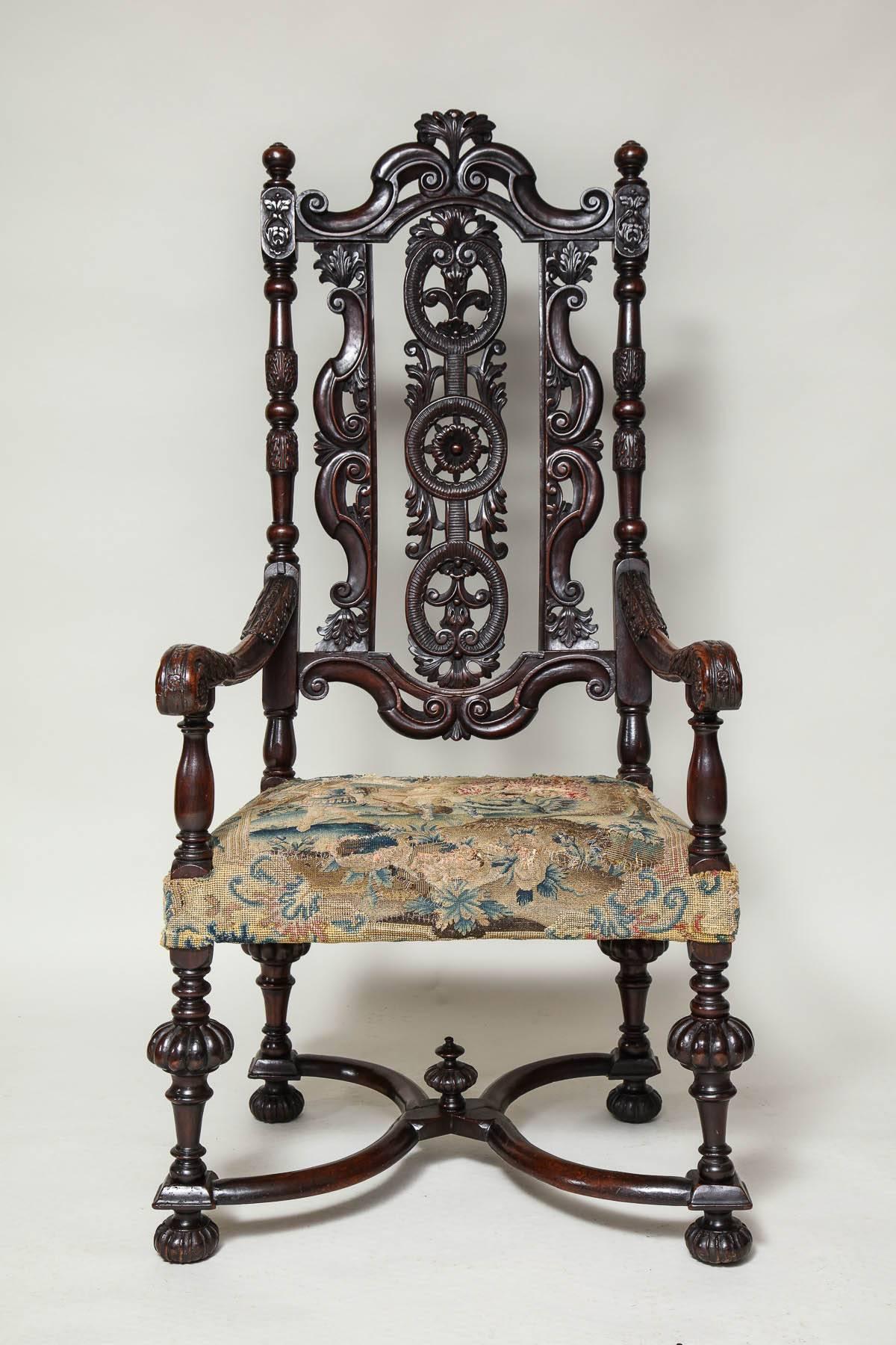 Very fine William III period walnut armchair, the pierced and foliate carved back with 