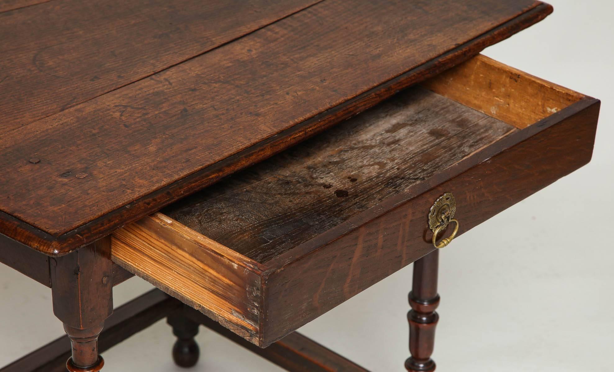 Early 18th Century English Oak and Fruitwood Stretcher Base Table