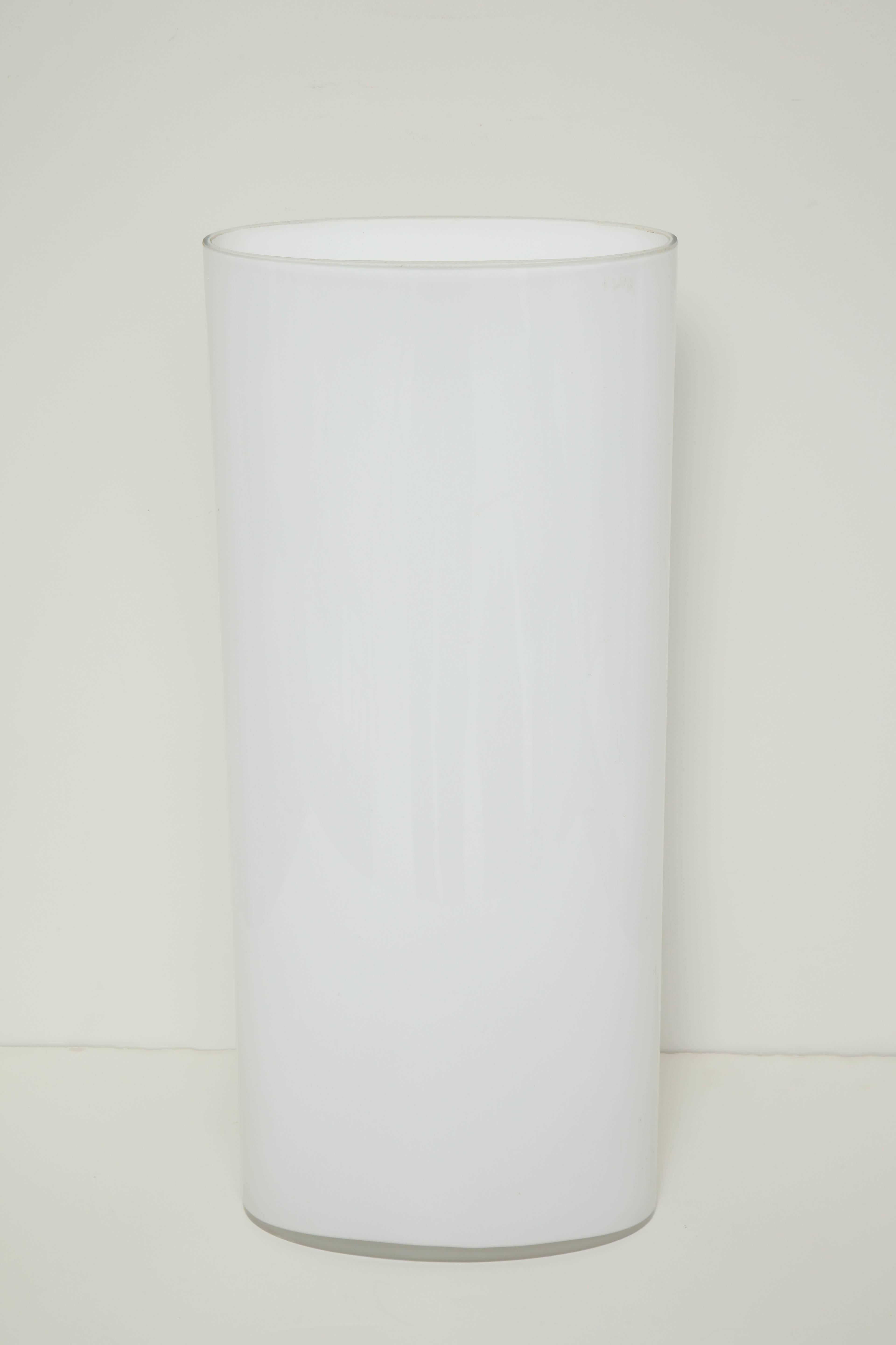 A 20th century Italian white glass umbrella stand or vase.