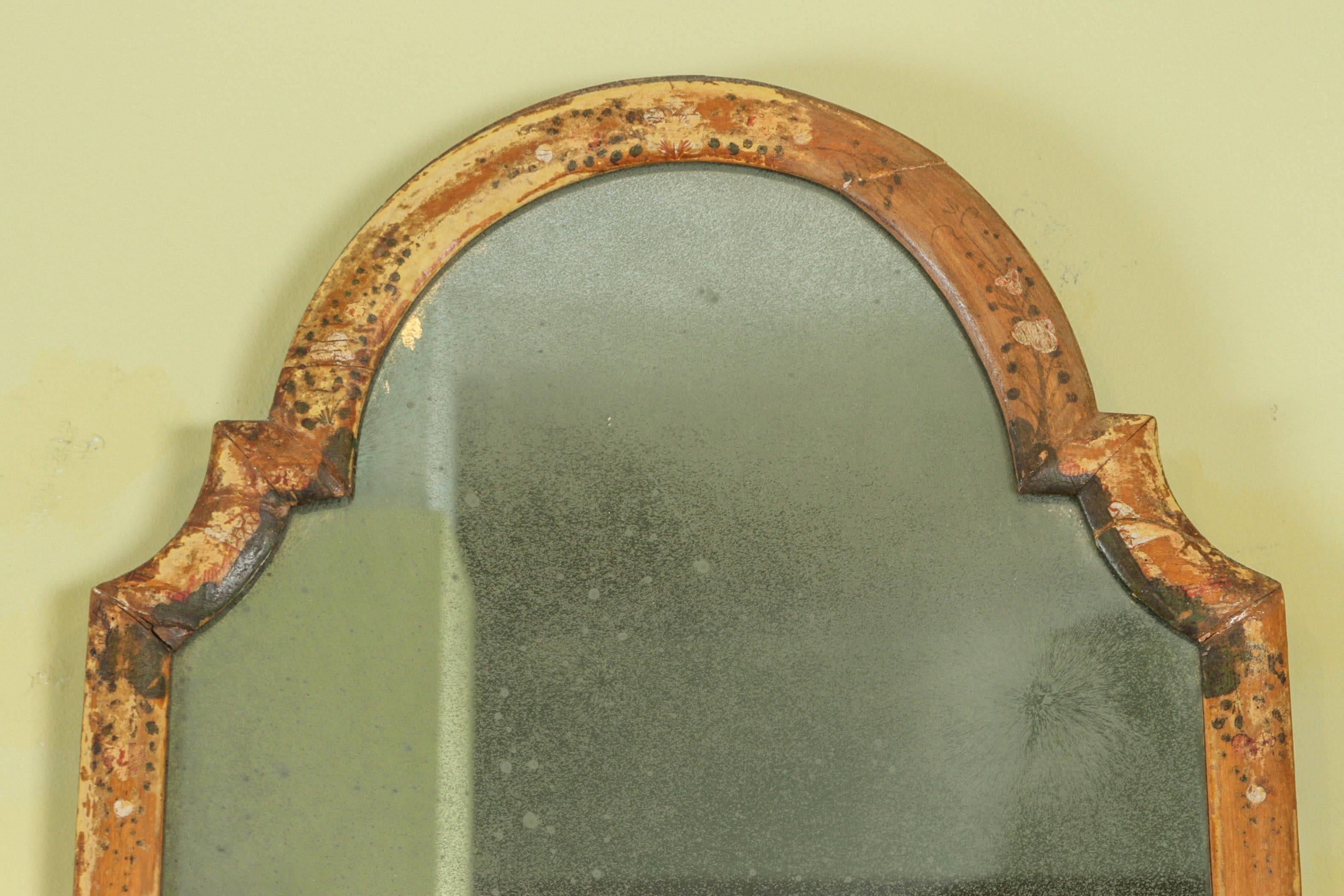 Small Italian mirror with traces of original painted decoration, early 19th century.