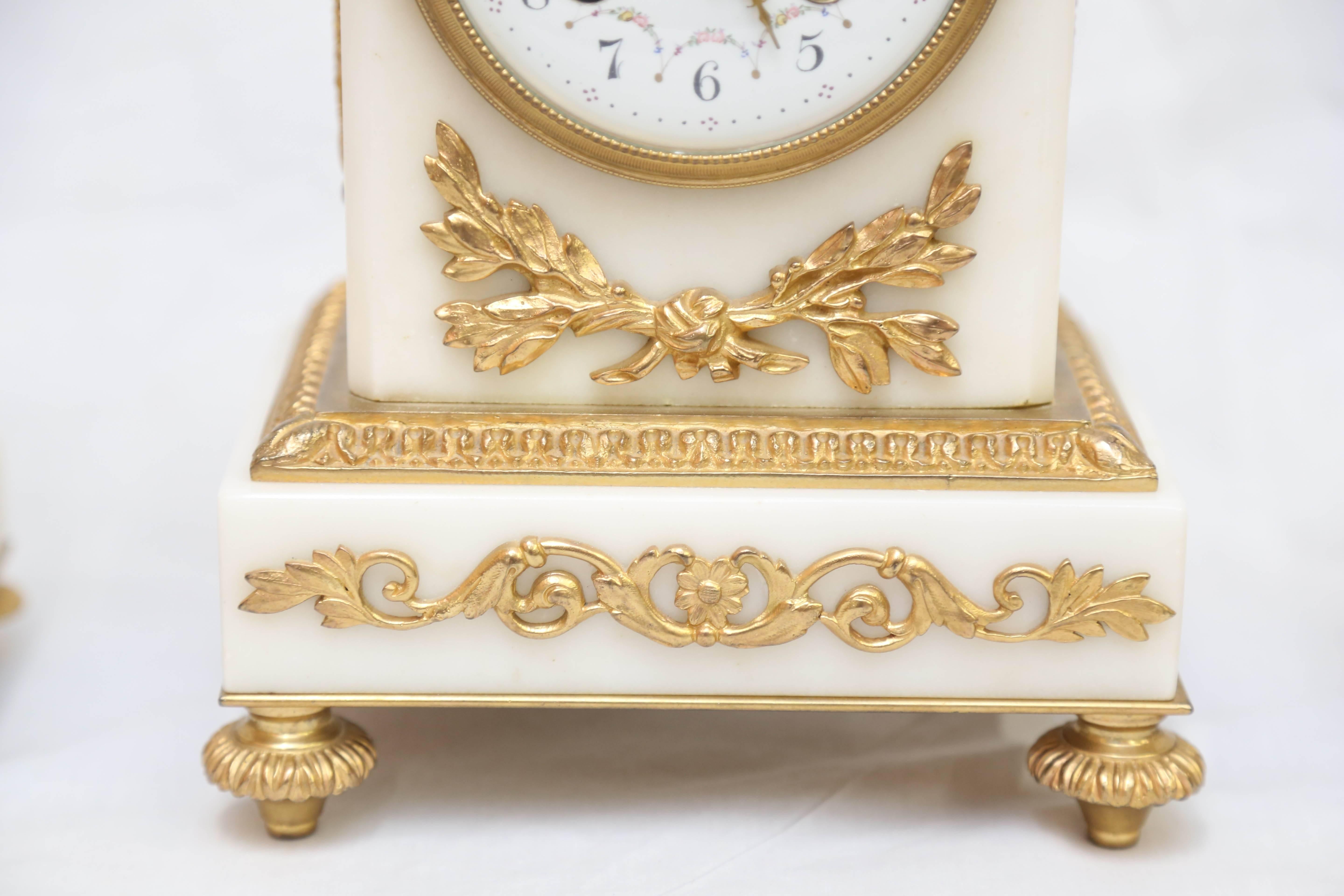 Three-Piece Louis XVI Style Ormolu and Marble Clock Garniture by Samuel Marti In Excellent Condition In New York, NY