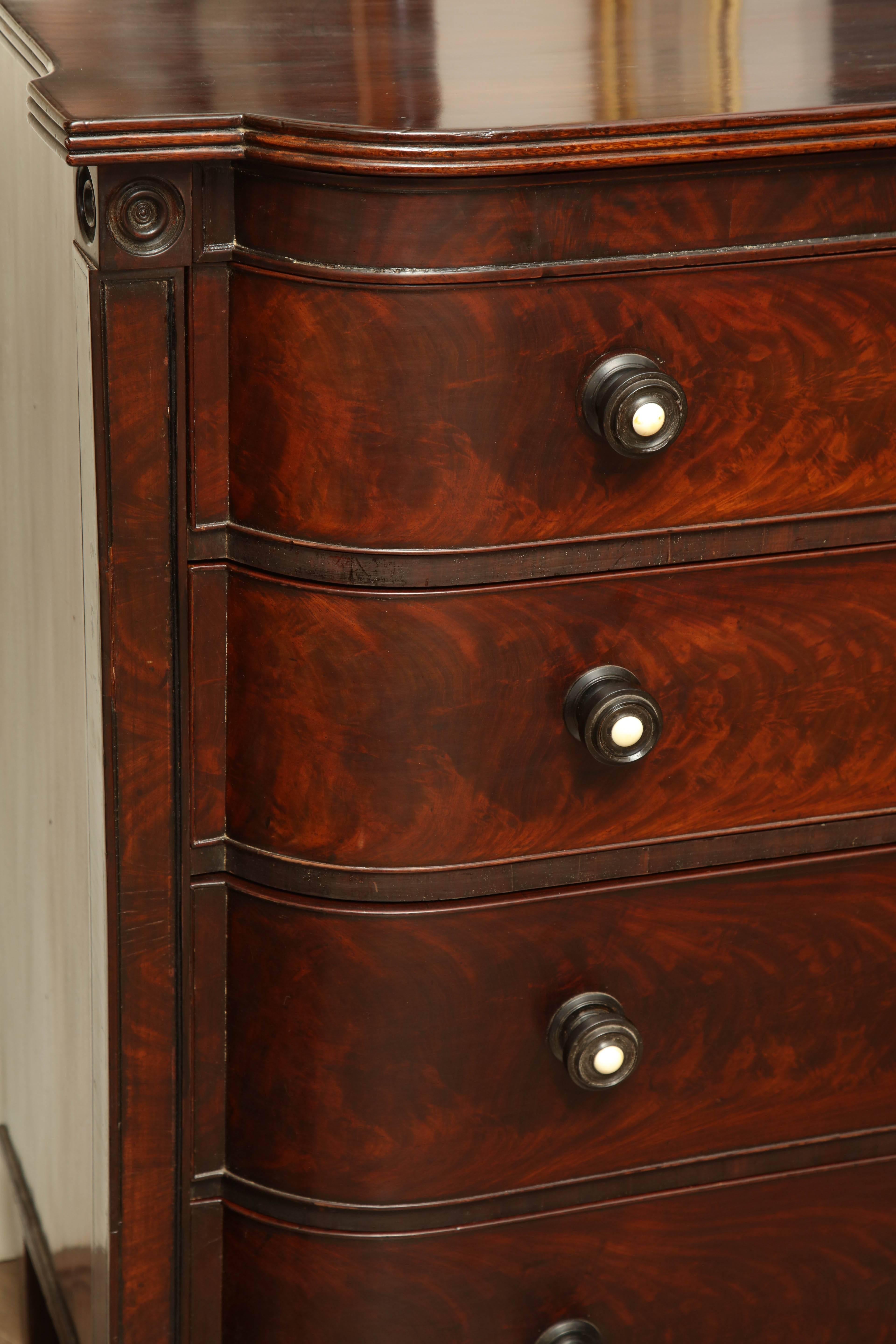 Mid-19th century English, four-drawer chest in mahogany.