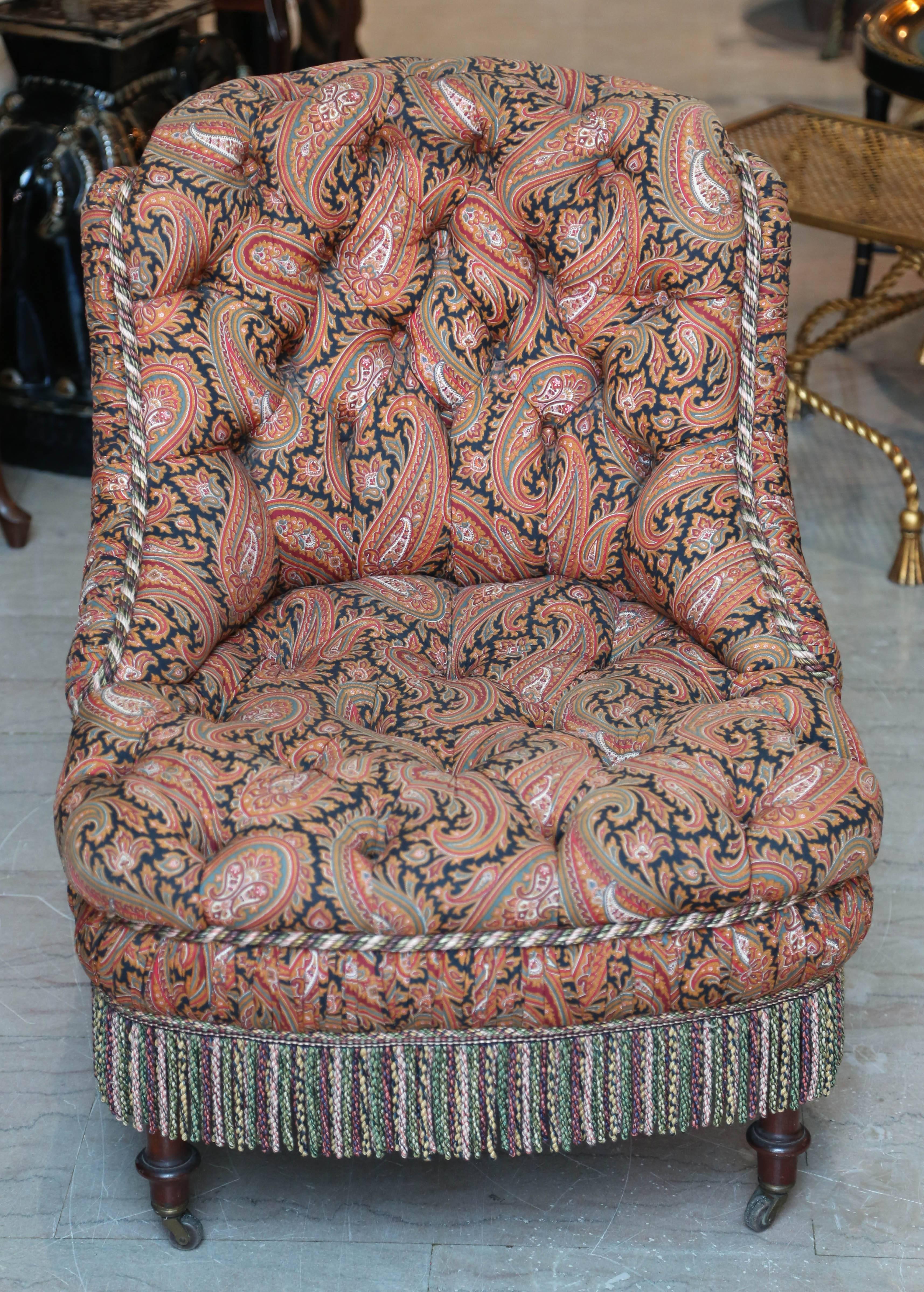 Comfortable 19th century English chair covered in a fine paisley fabric.