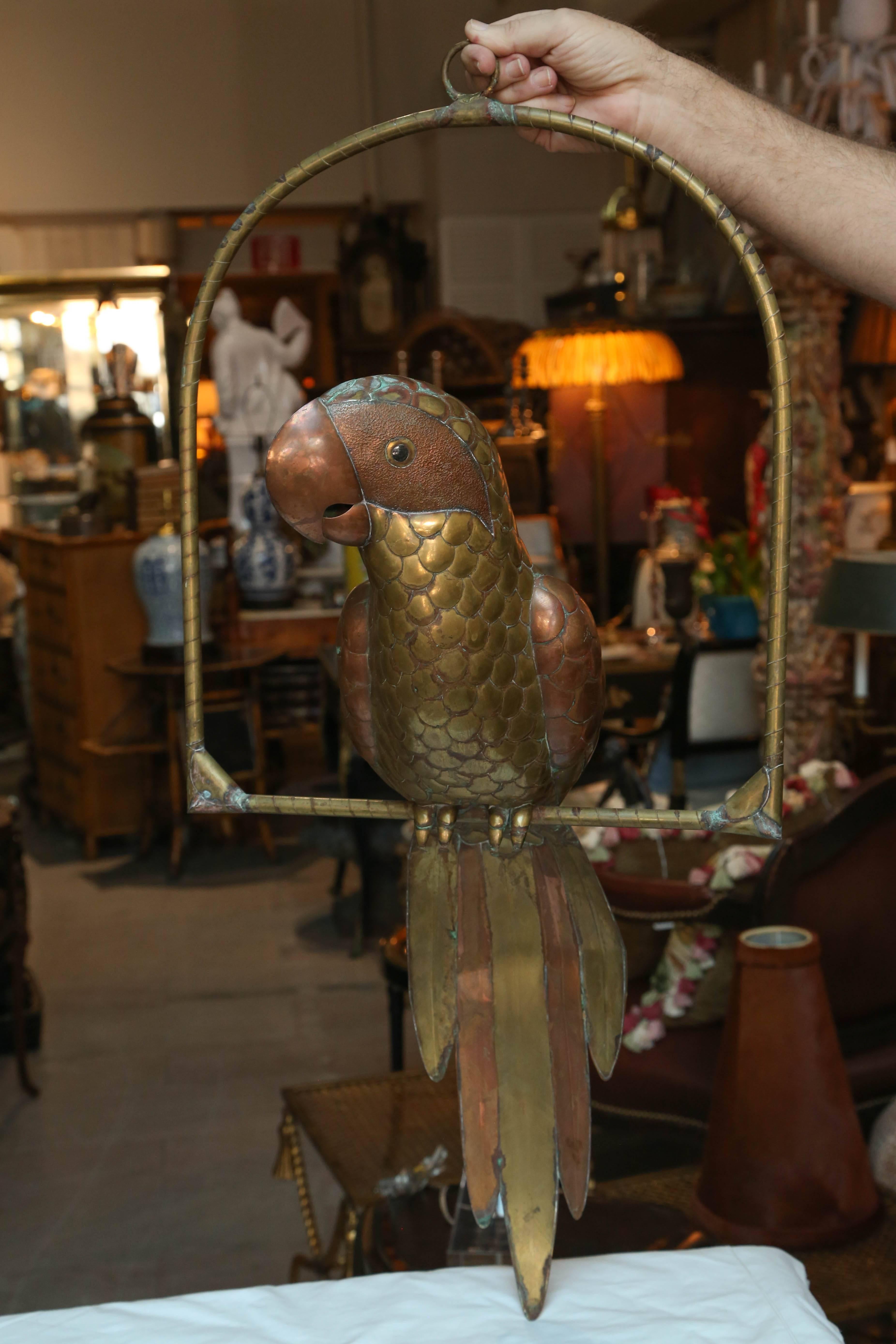 Eye-catching scale, a fine whimsical brass and copper rendition appointed with glass eyes.