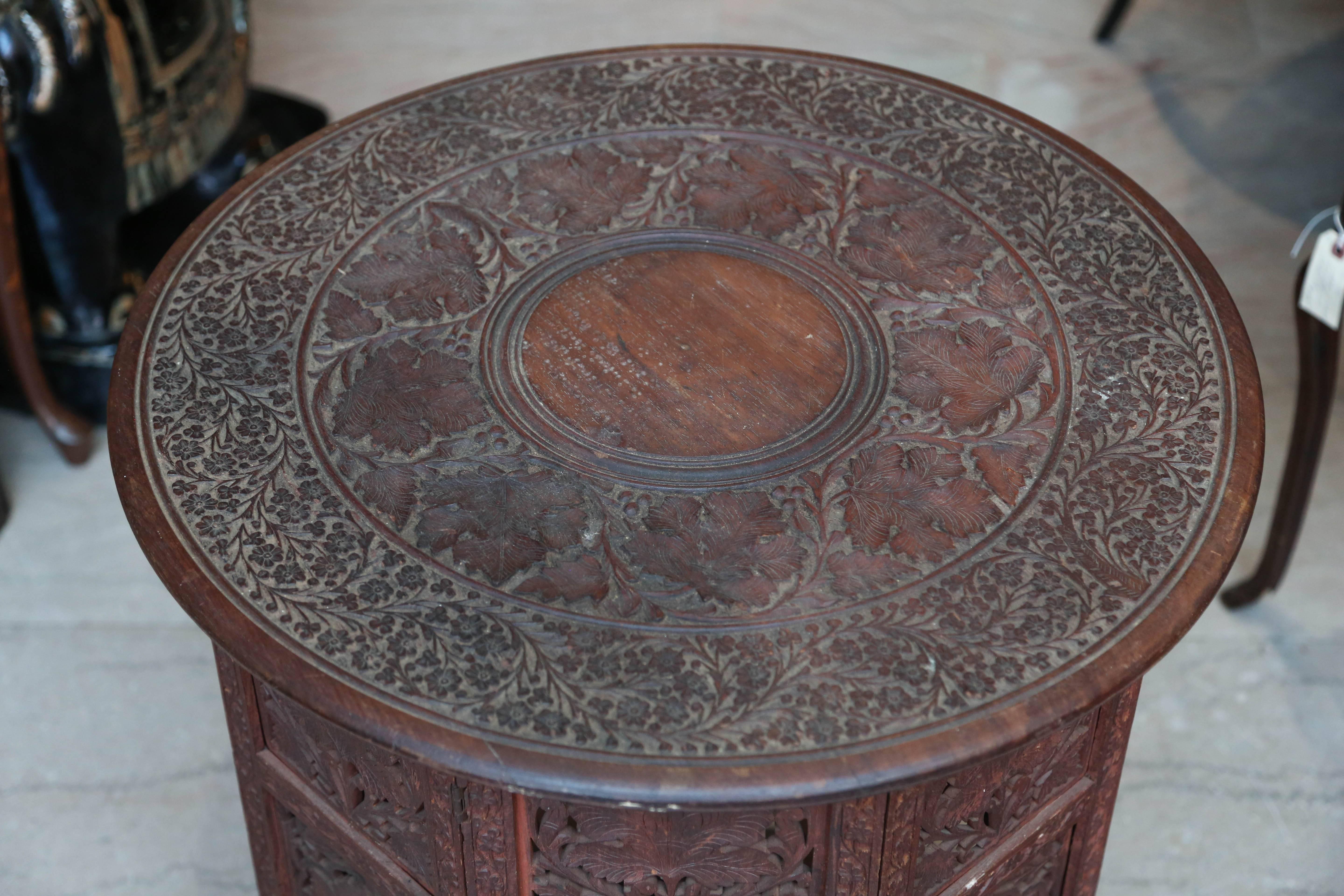 An elaborately carved and generously scaled pair, Classic octagon styled base.