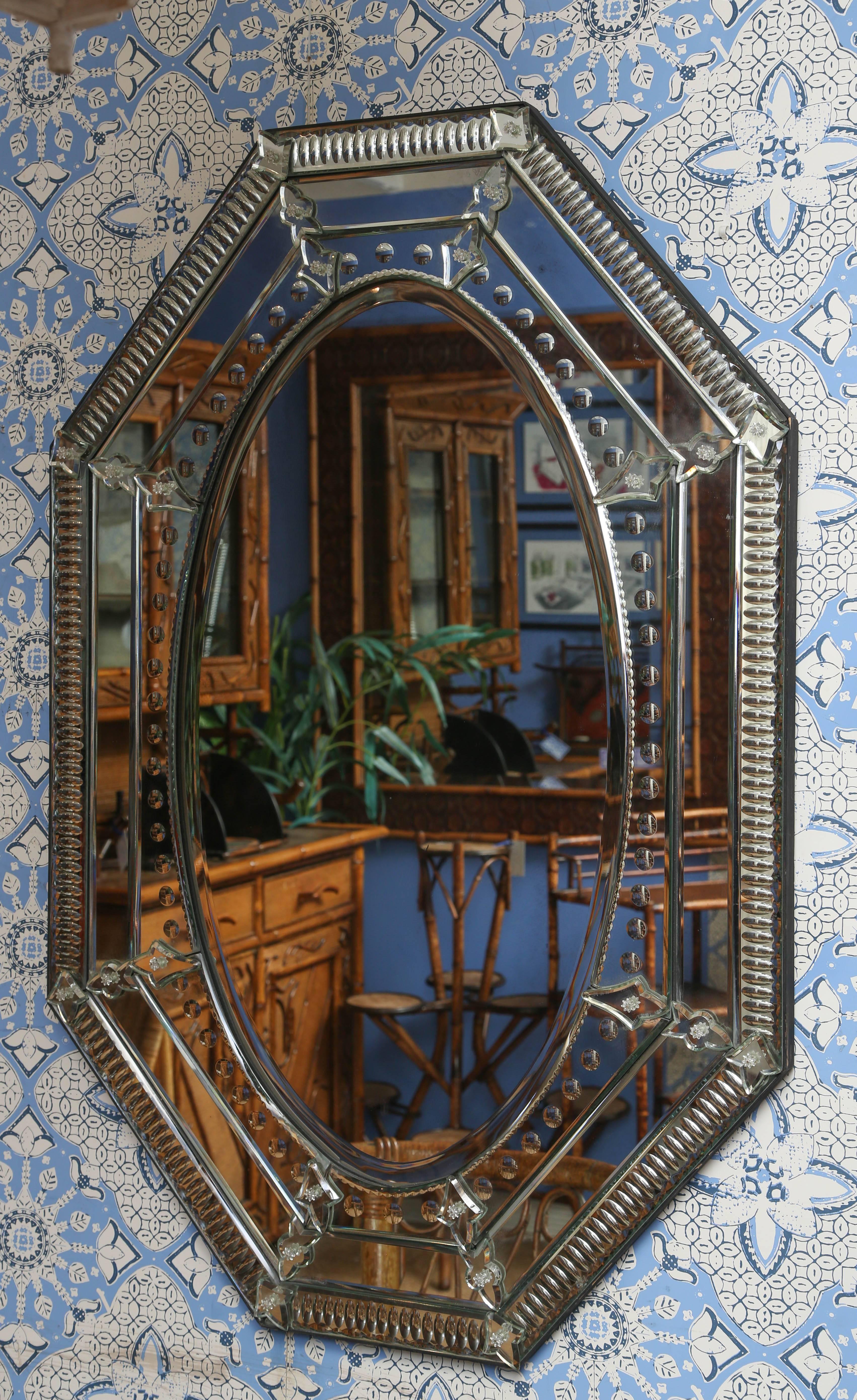 Very nice lady Venetian mirror with plenty of details.