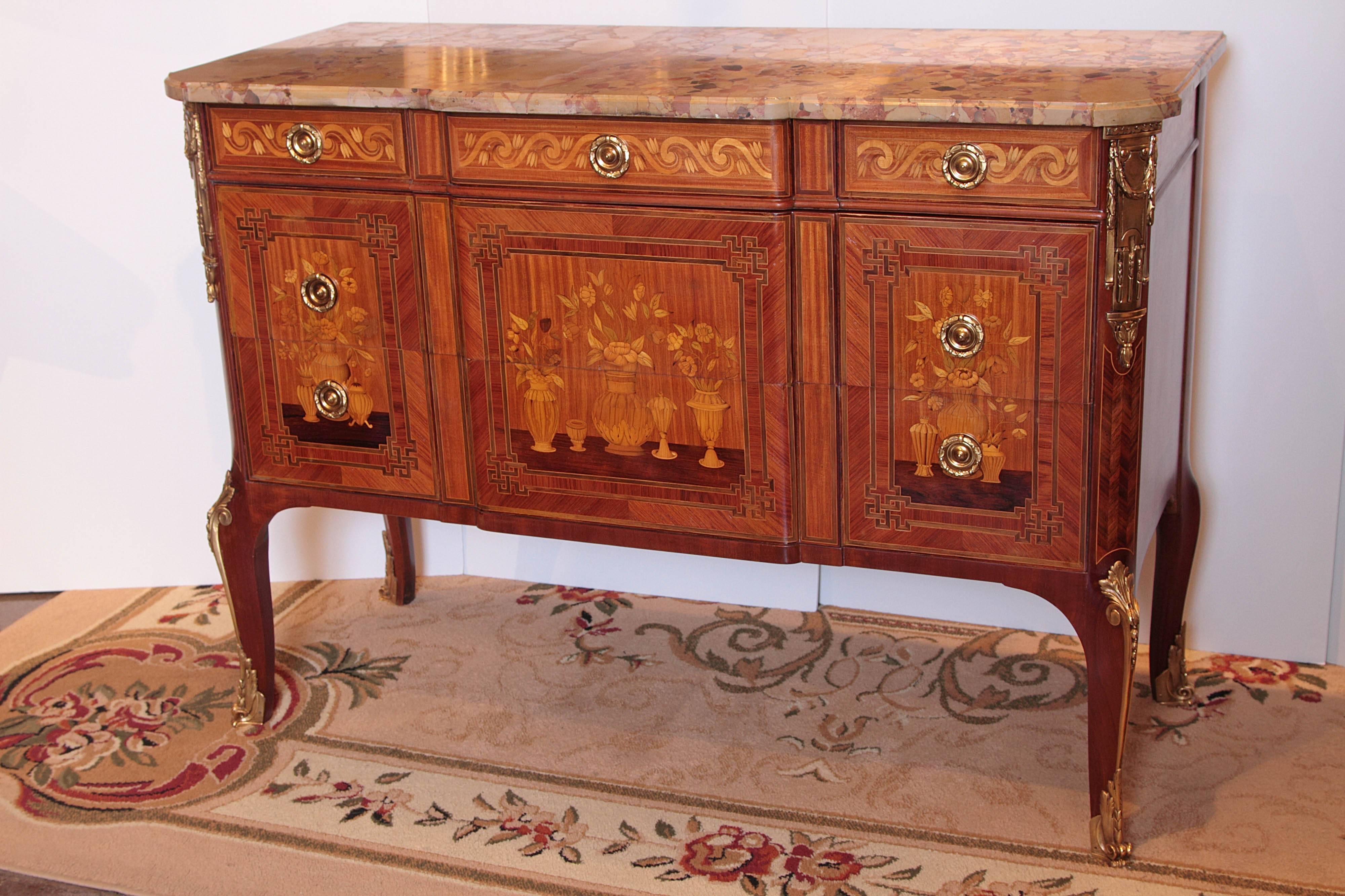 Pair of late 19th century French Louis XV marquetry and gilt bronze commodes. Breche d Alep marble top commodes. Bronzes signed P.E Guerin 

Fine quality detail beautiful marquetry inlays in tulipwood and satinwood and boxwood.