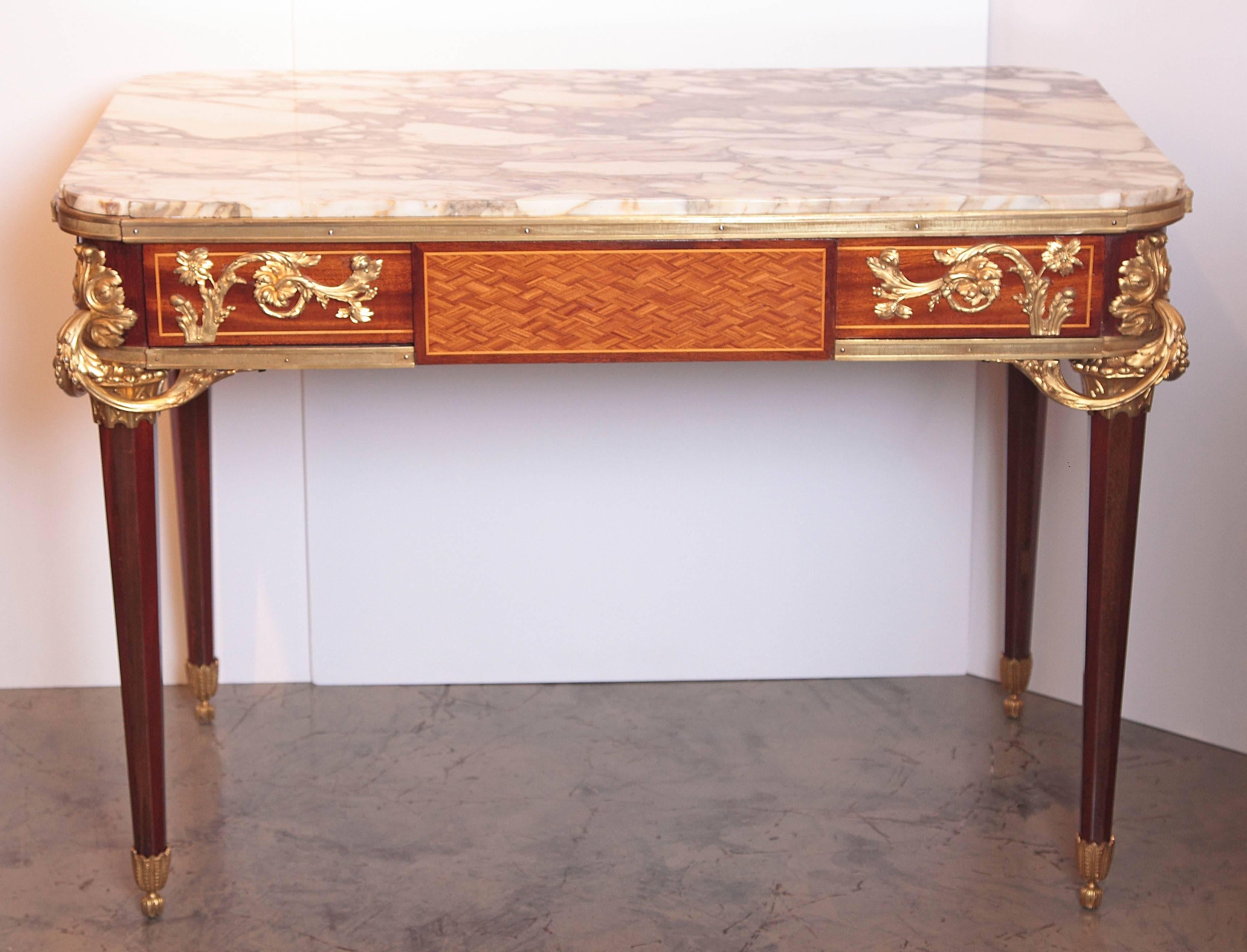19th century French Louis XVI parquetry and gilt bronze console table with mechanical drawer. Breche Violette marble-top. 