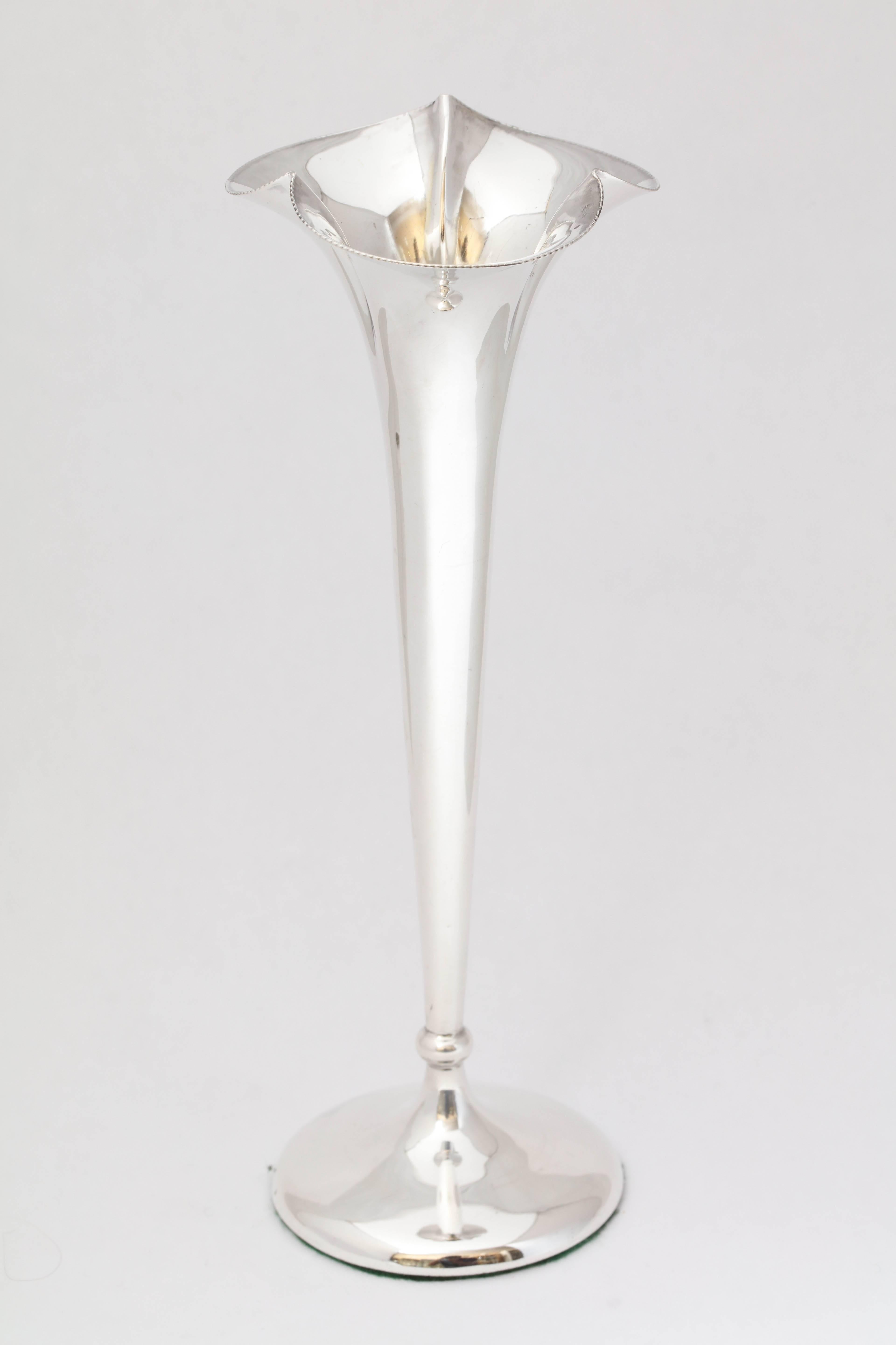 Edwardian, sterling silver bud vase with fluted top, Birmingham, England, 1903, Cornelius Desormeux Sanders and James Francis Hollings Shepherd - makers. Measures: 8 inches tall x 3 inches diameter across fluted opening x 2 1/2 inches diameter