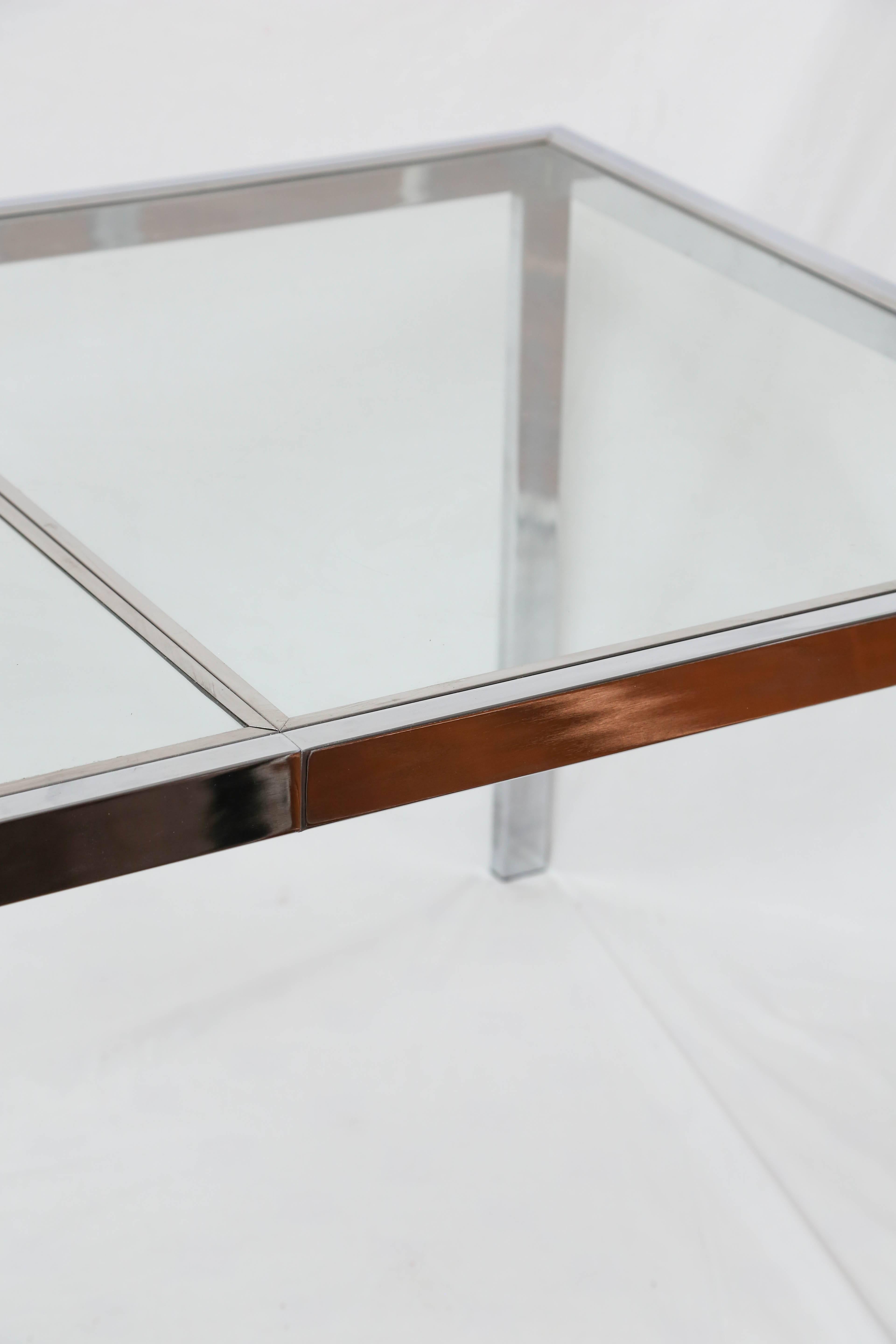 Expandable table in chrome by Milo Baughman

Measures: Leaf is 20
