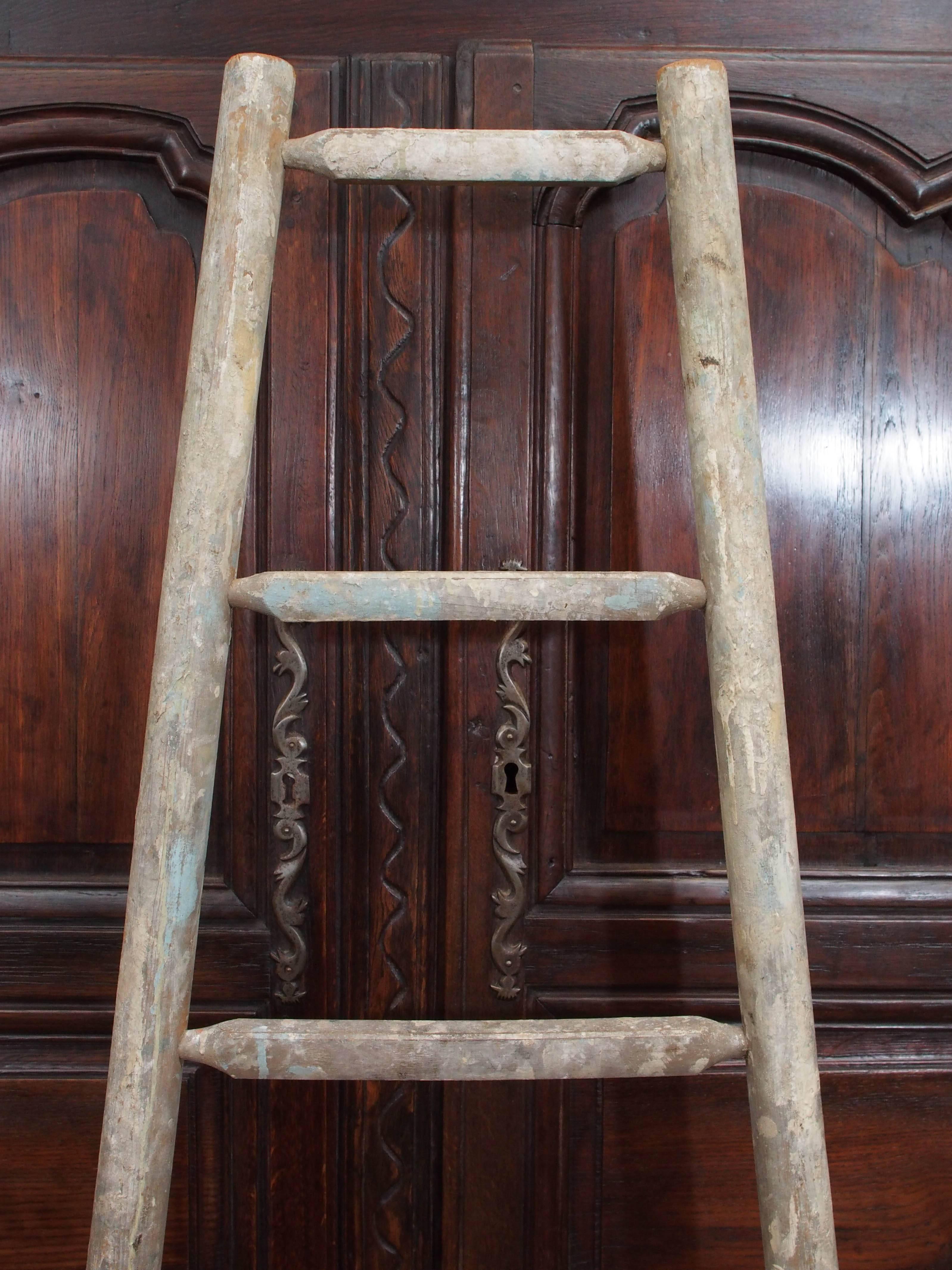 Late 19th century English handmade orchard ladder used for picking fruit.
