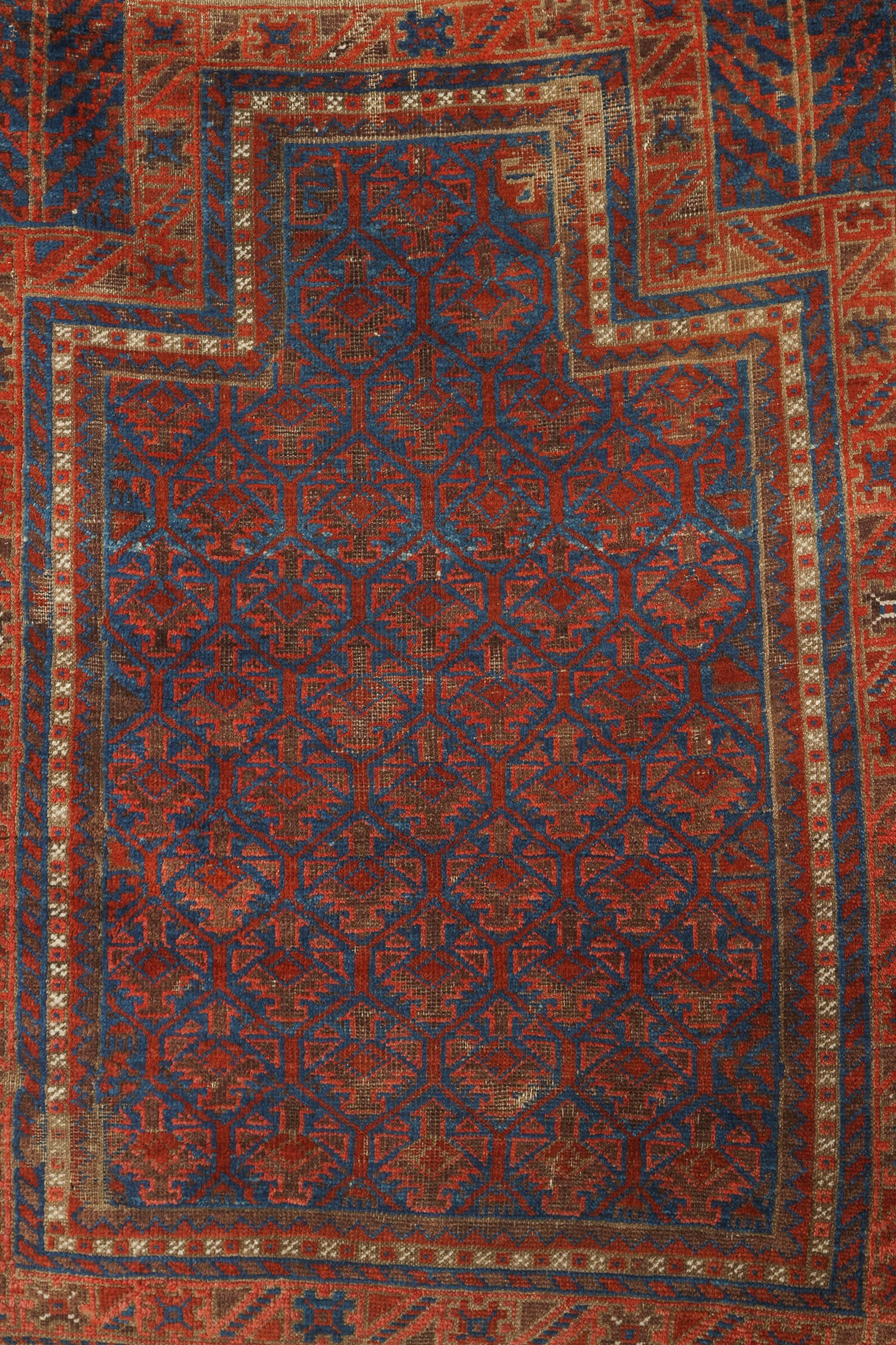 Handwoven, hand spun wool tribal rug. Unusual blue field. Even wear with one small area quite low. Rug complete with quite sizable Kilim ends. Some missing wool on overcast sides.