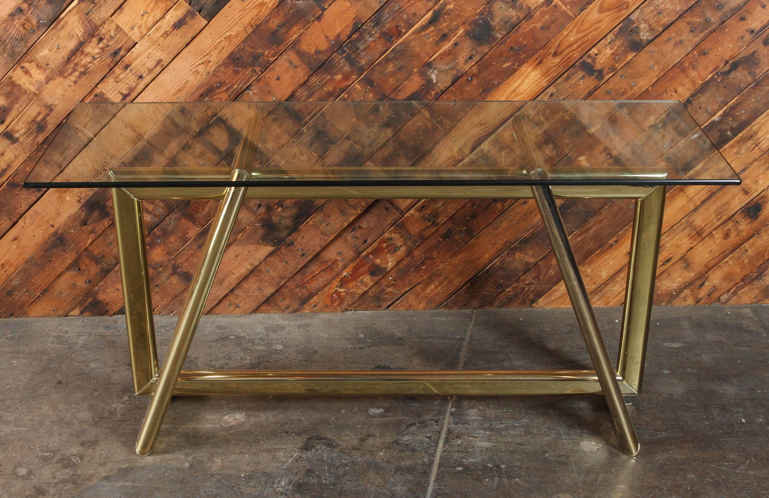 Vintage sculptural brass base thick glass console table

thick beveled glass, beautiful sculptural brass base, in good condition except for one small spot has faded as shown and some scratches, could use re platting 

Measures: Length 54, height